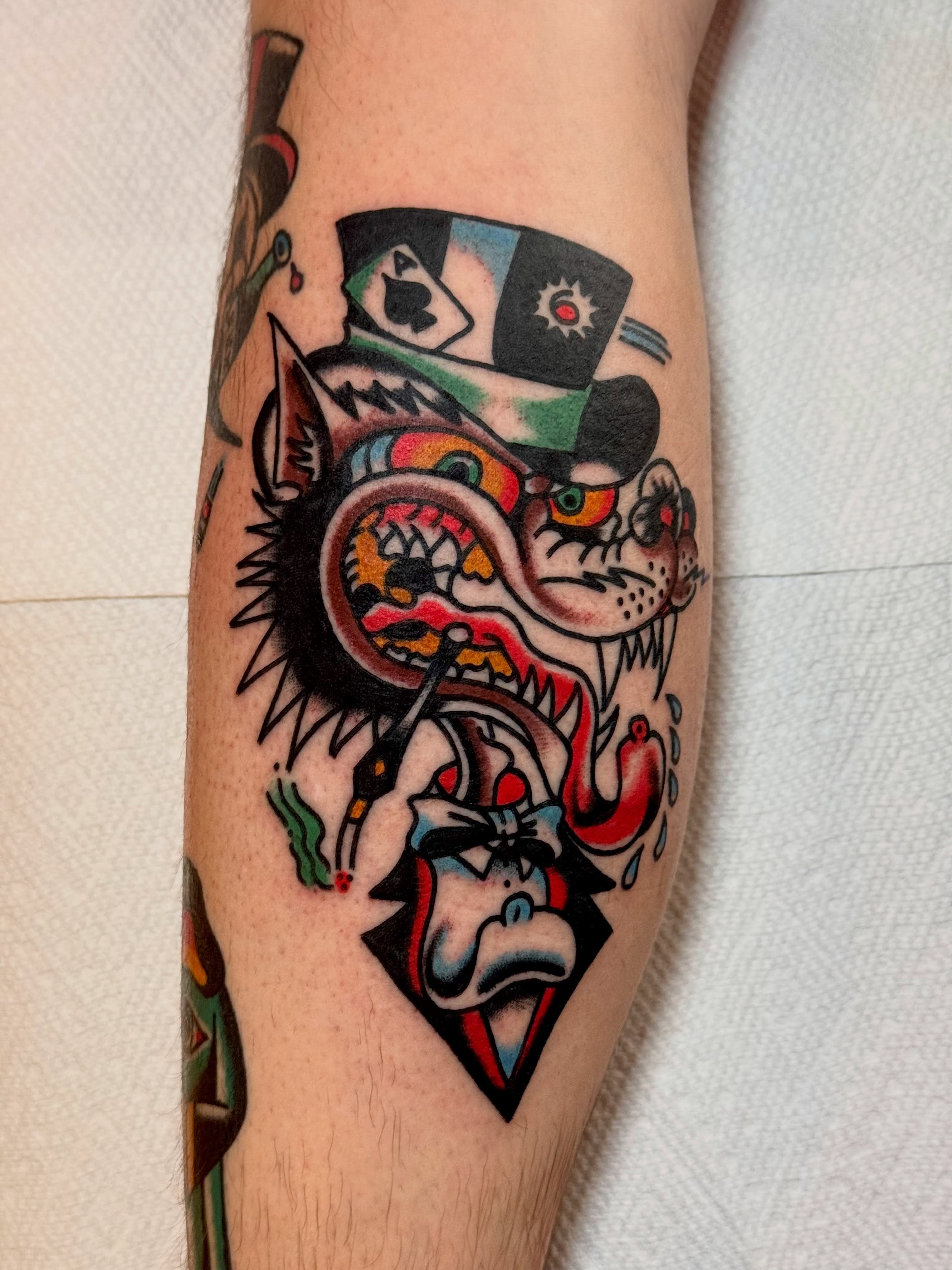Cat with top hat American traditional tattoo on the forearm by Zach Lemieux