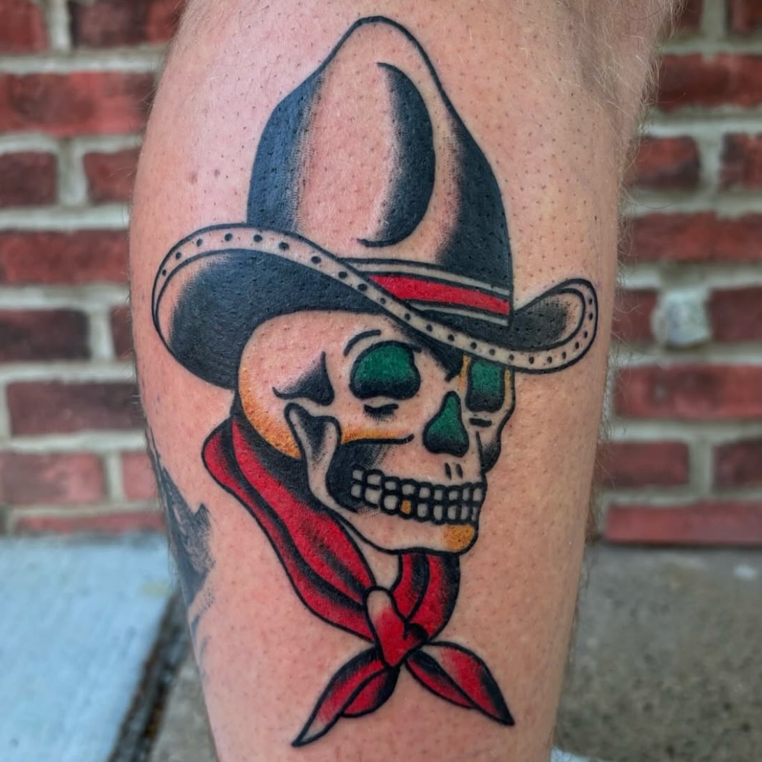 Cowboy skull American traditional tattoo on the forearm by Cooper Reichwein