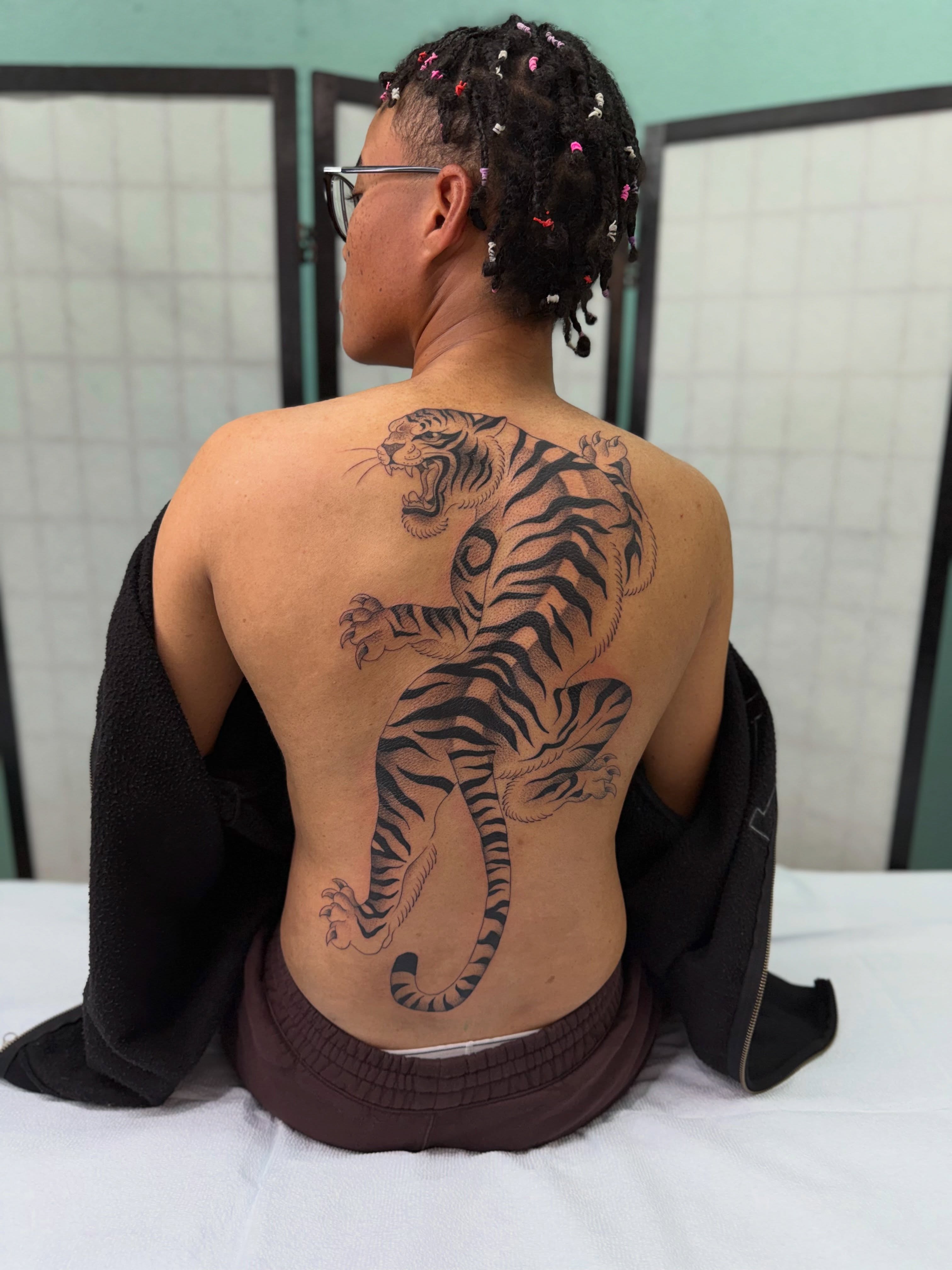 Tiger realism tattoo on the back by christian martinez