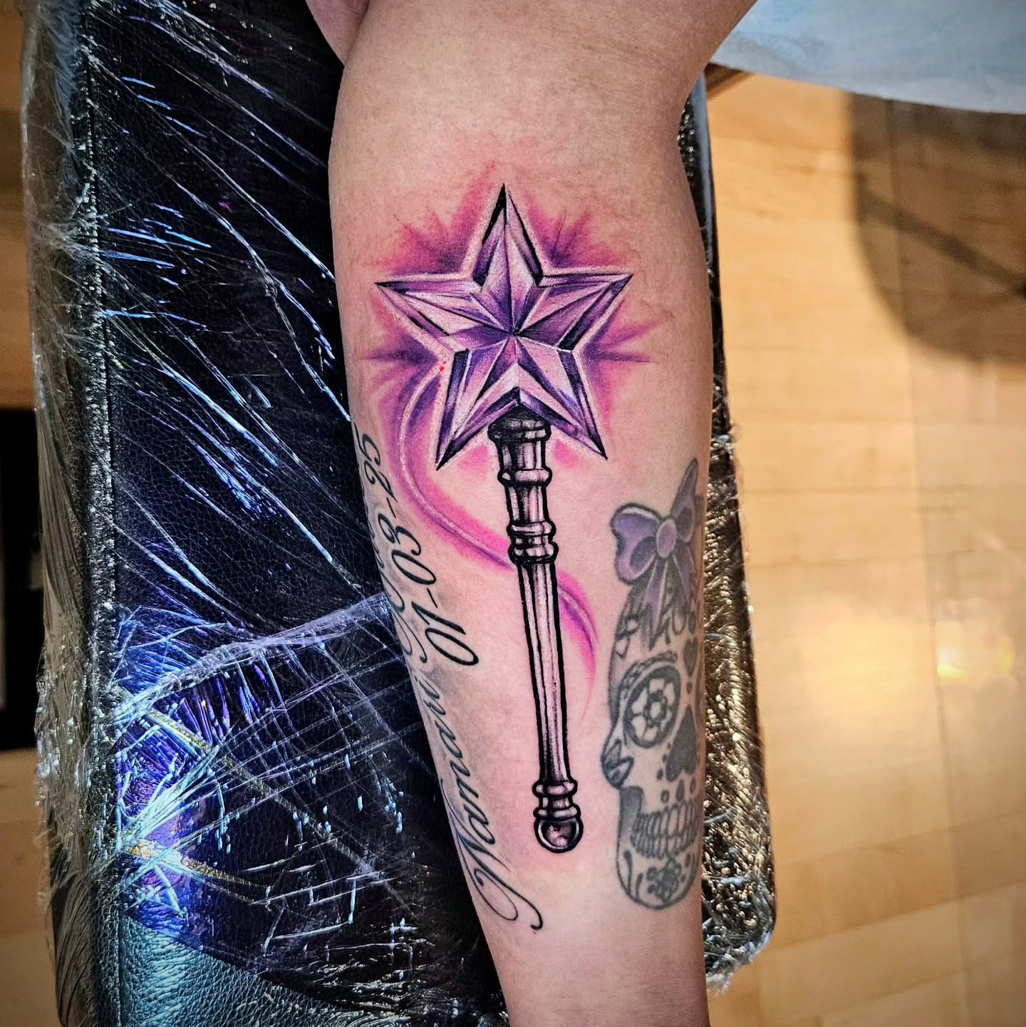 Star wand new school tattoo on the forearm by Justin J-rust Smith