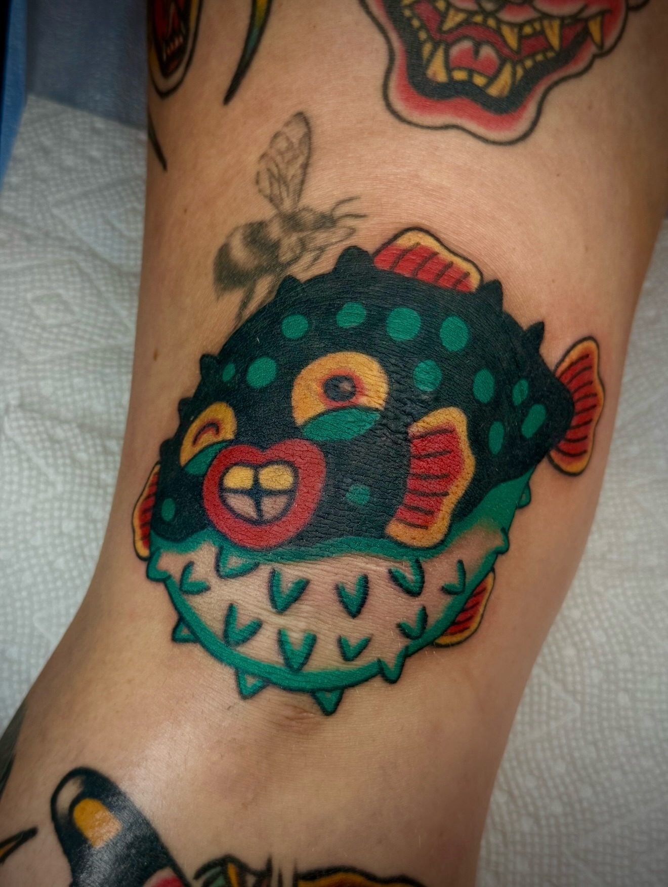 Pufferfish American traditional tattoo on the forearm by Zac Clark