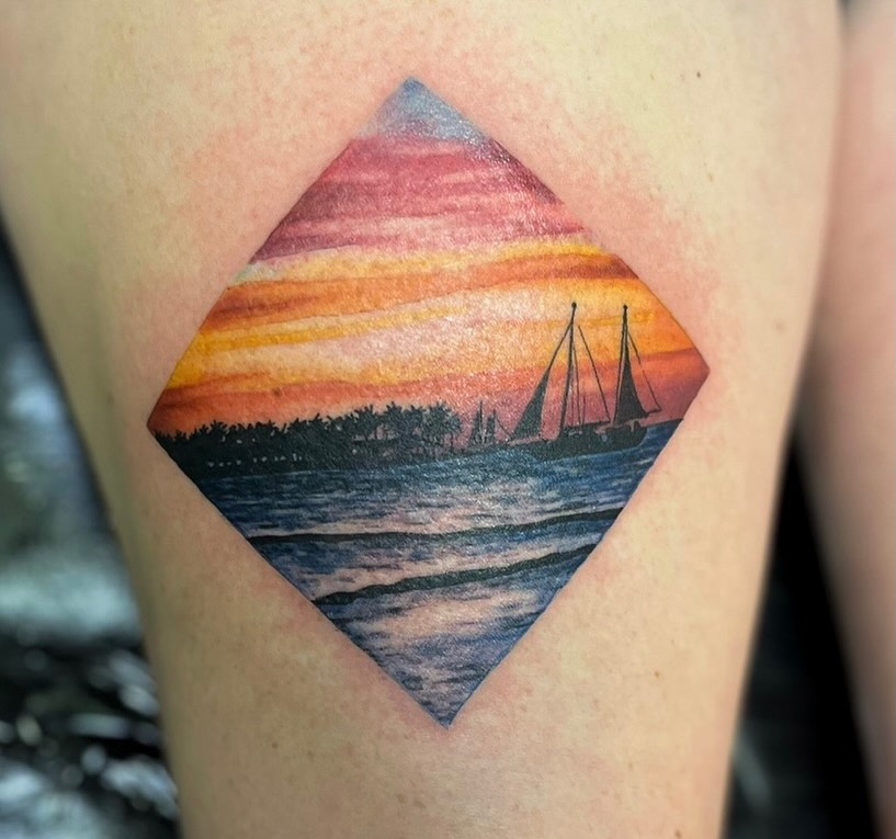 Sunset over sea watercolor tattoo on the thigh by Taylor Tha Color Queen