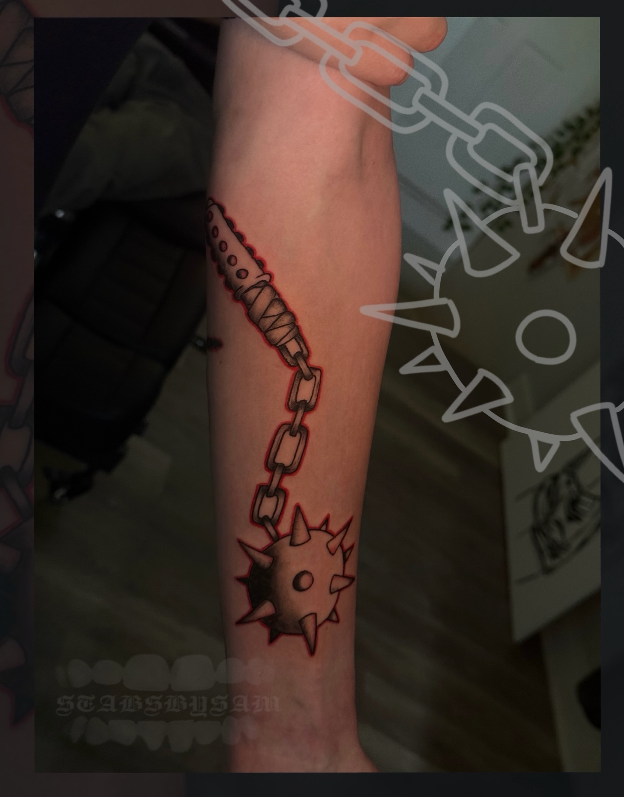 Chain and spiked ball neo-traditional tattoo on the forearm by licensed charlotte tattoo artist