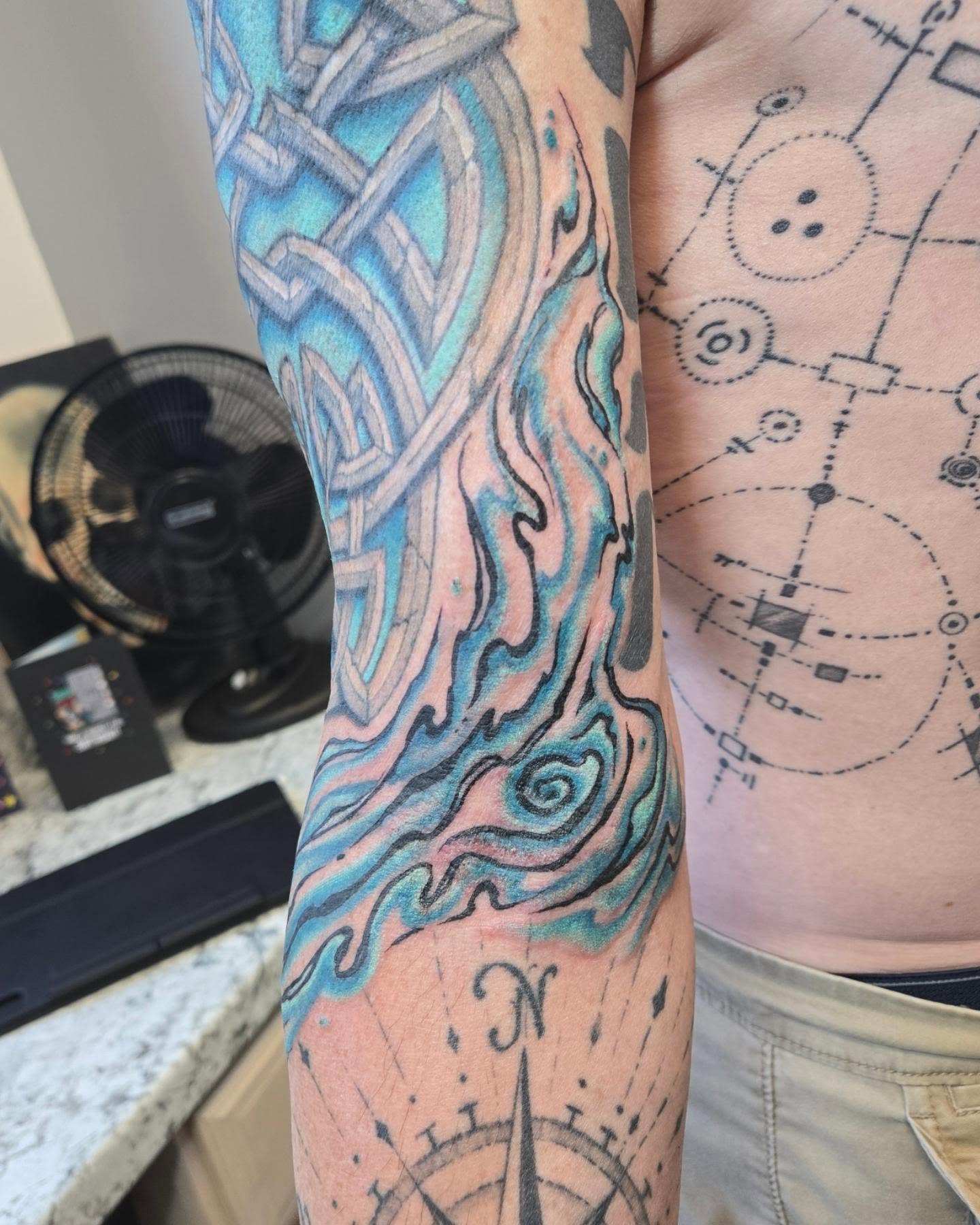 Tattoo by @beardsley_tattoos — geometric, watercolor
