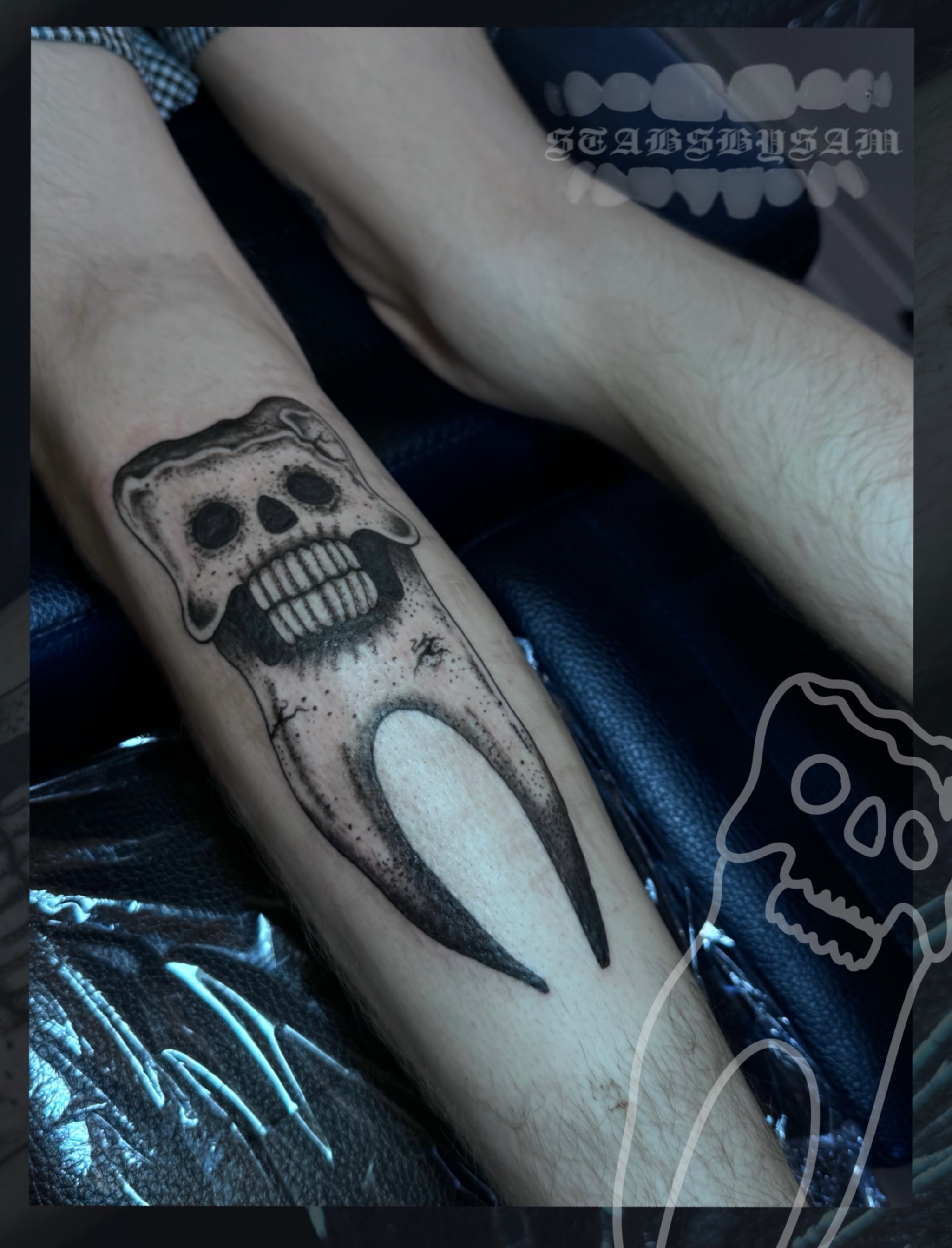 Skull black and grey tattoo on the forearm by licensed charlotte tattoo artist