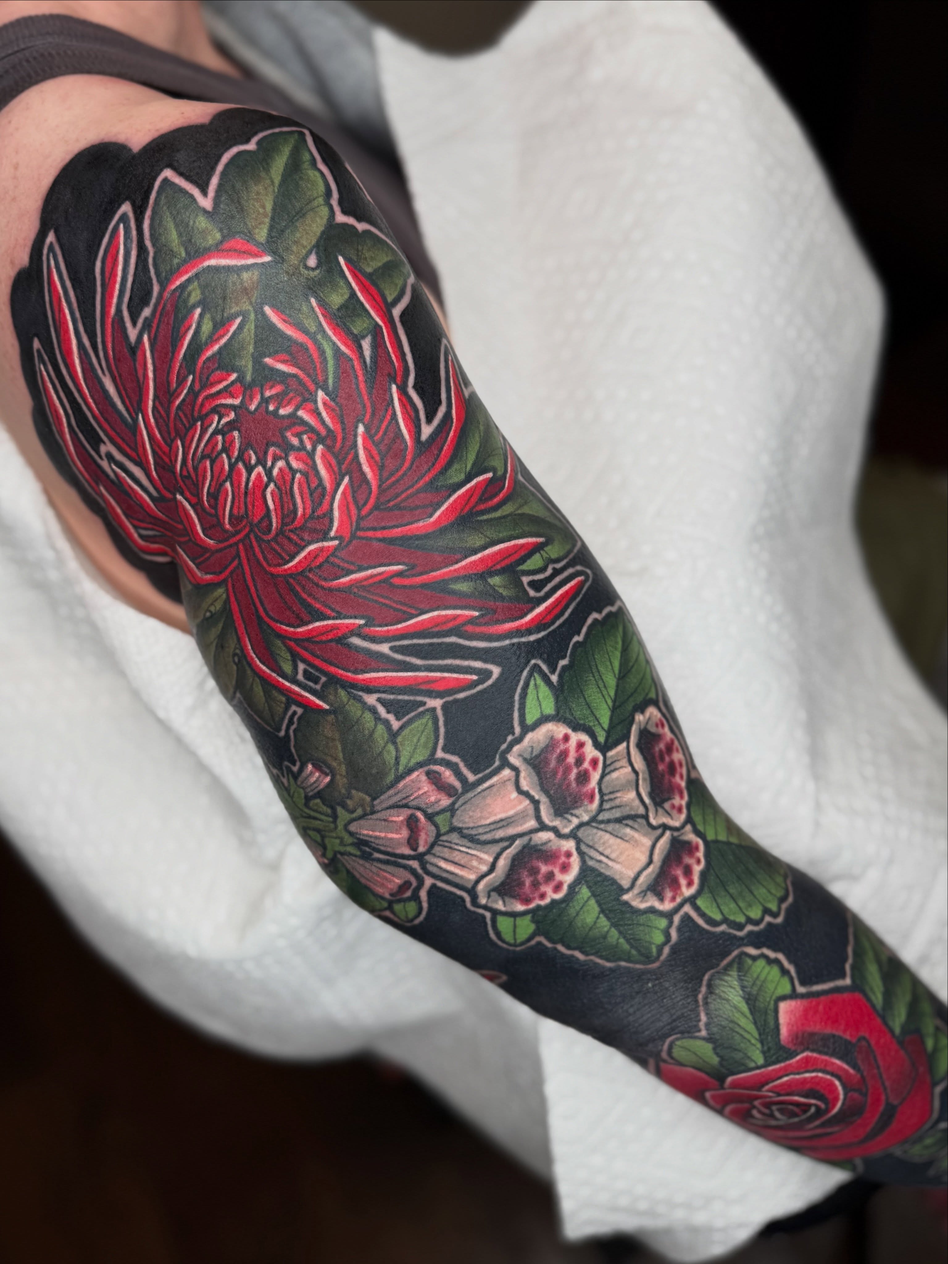 Floral arrangement American traditional tattoo on the forearm by T Dubs ✏️