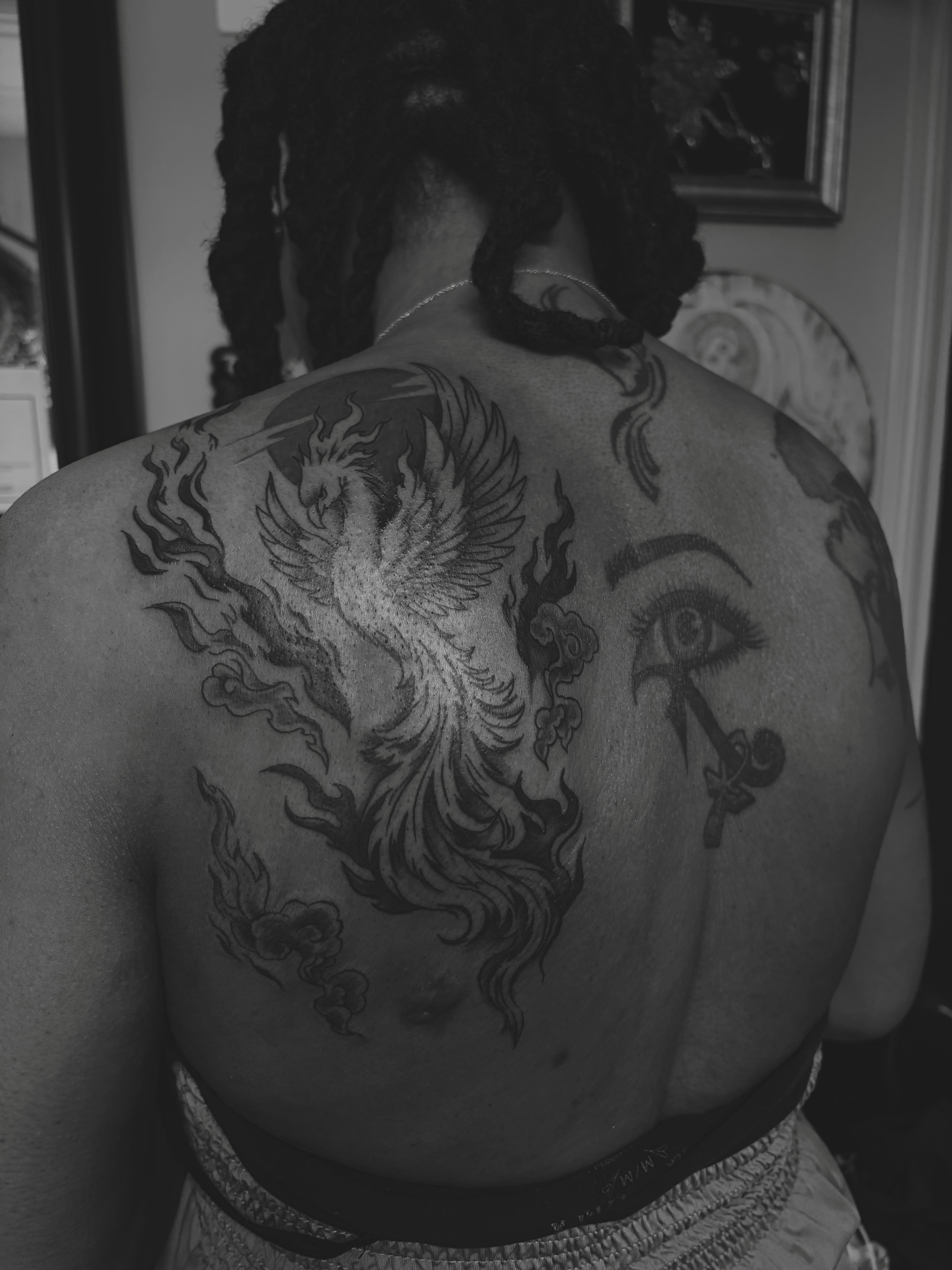Phoenix black and grey tattoo on the back by ⚜️Embodied Tattoo⚜️, Columbus, Ohio