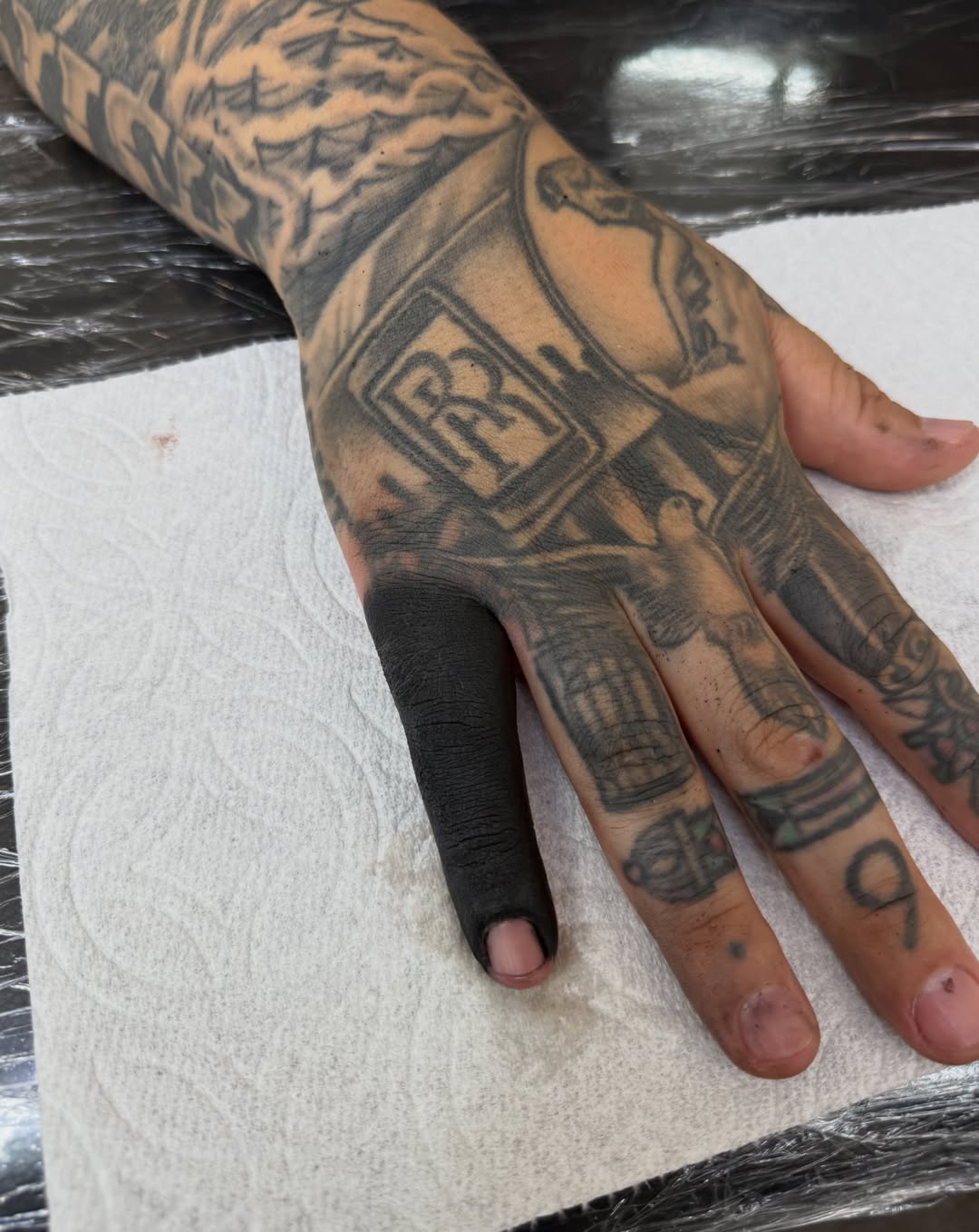 Hand with detailed tattoos black and grey tattoo on the hand by @samg_tat2s, San Diego, California