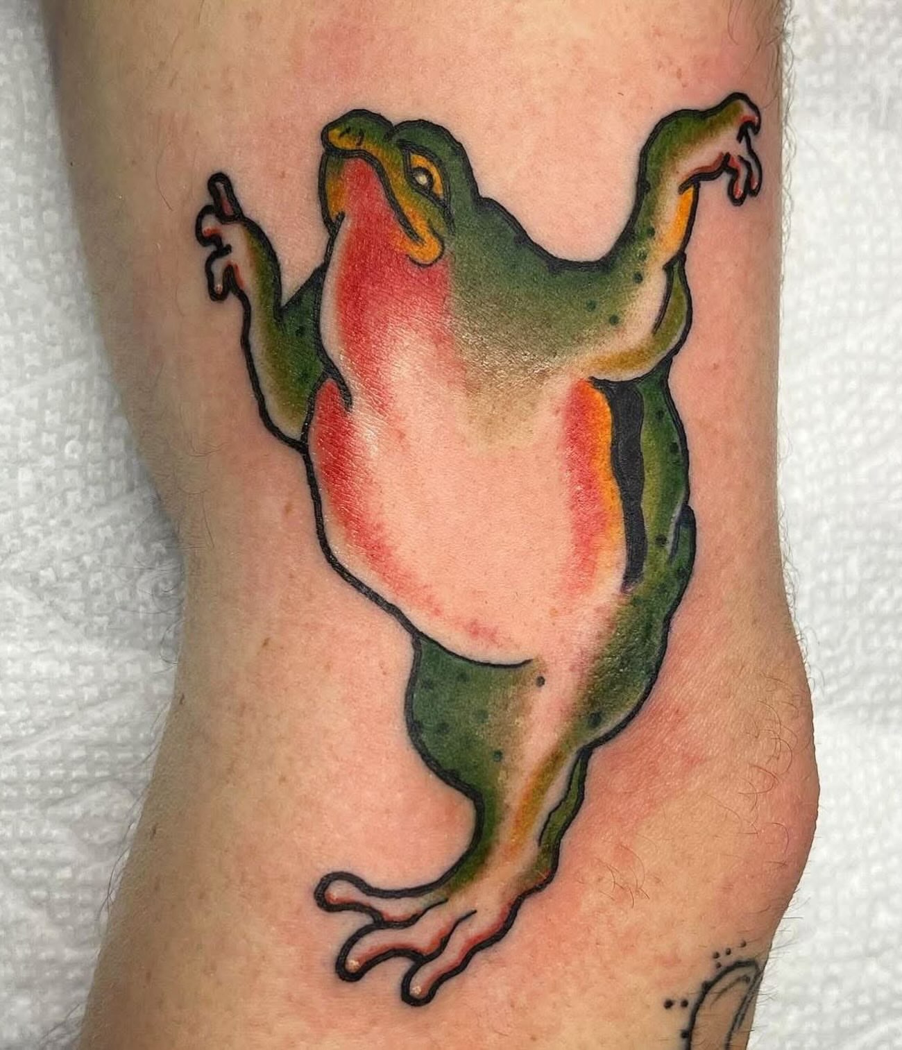 Frog American traditional tattoo on the forearm by Arron Albaugh
