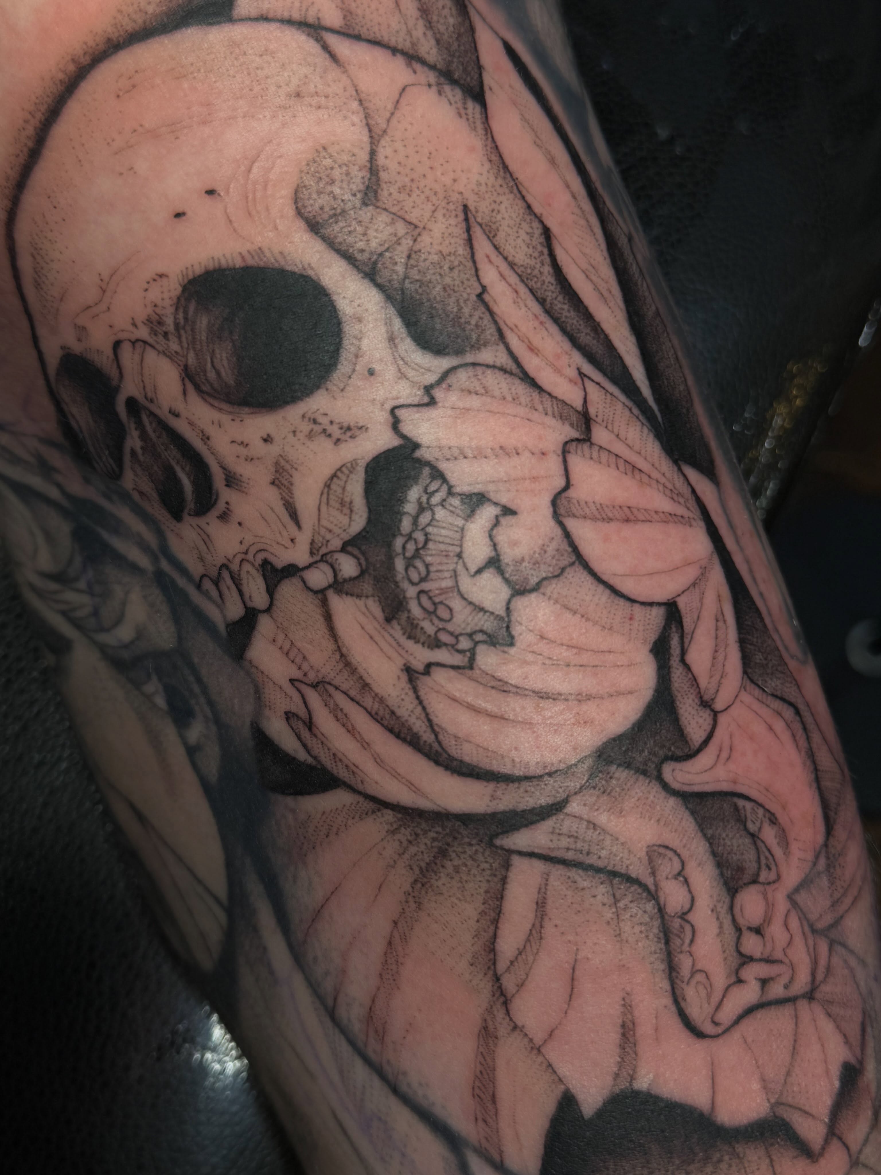 Skull dotwork tattoo on the forearm by Michela's Tattoo's