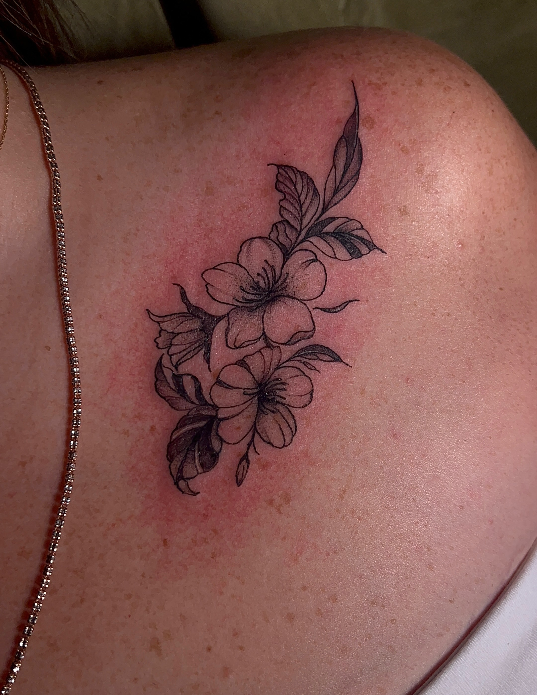 Cherry blossoms black and grey tattoo on the shoulder by V