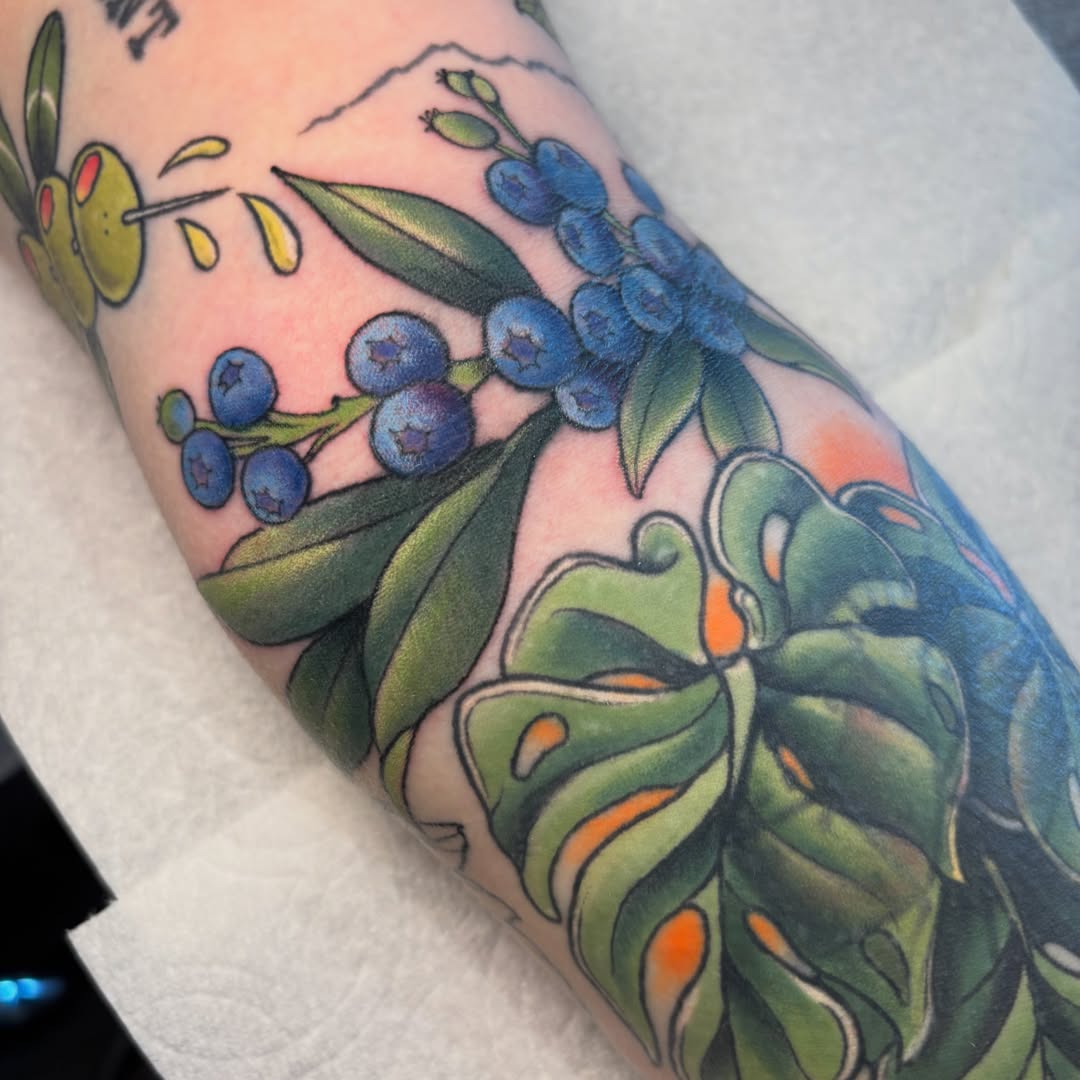 Fruit and leaves new school tattoo on the forearm by ✨REiD✨