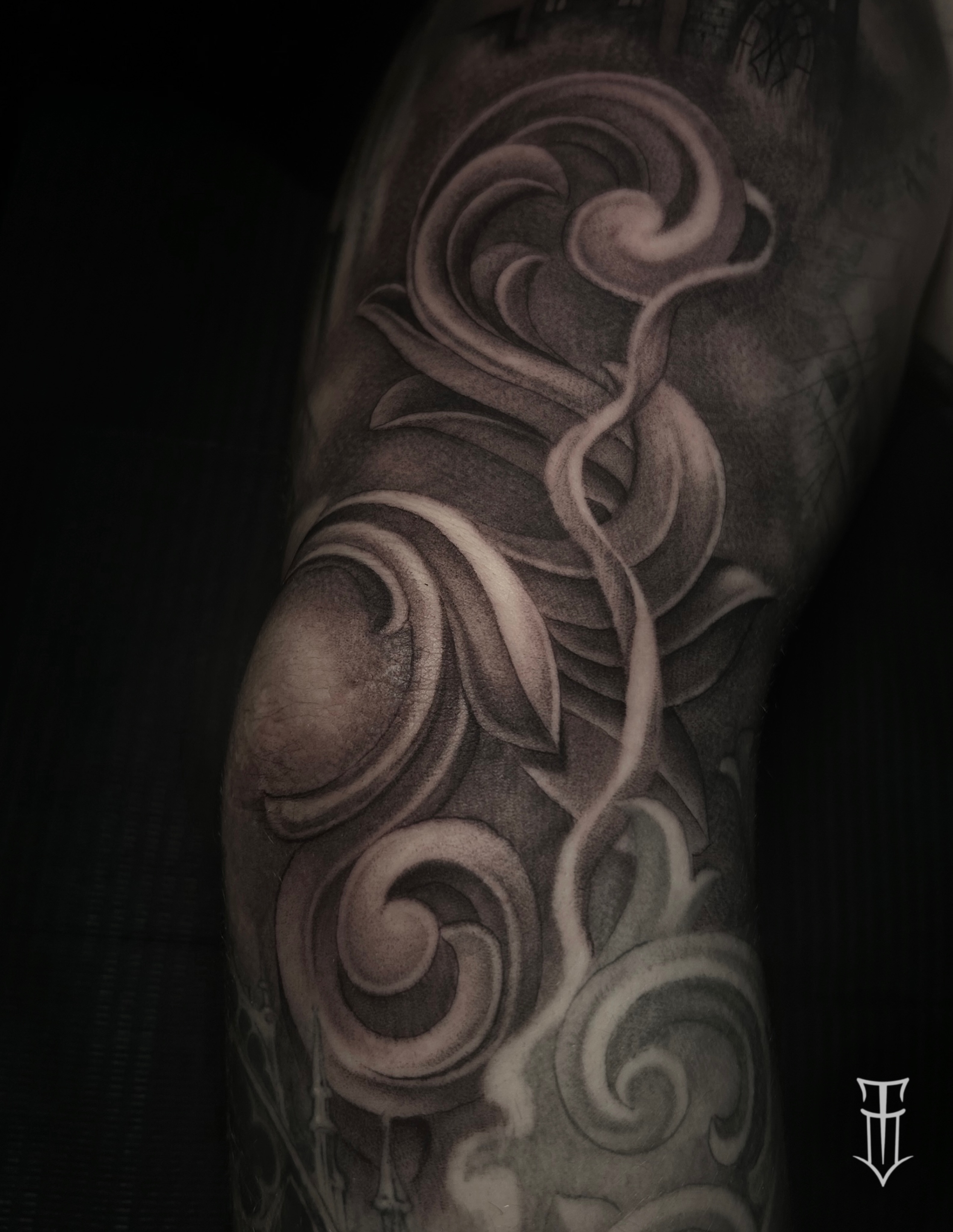 Swirls geometric tattoo on the forearm by Tyler Osburn