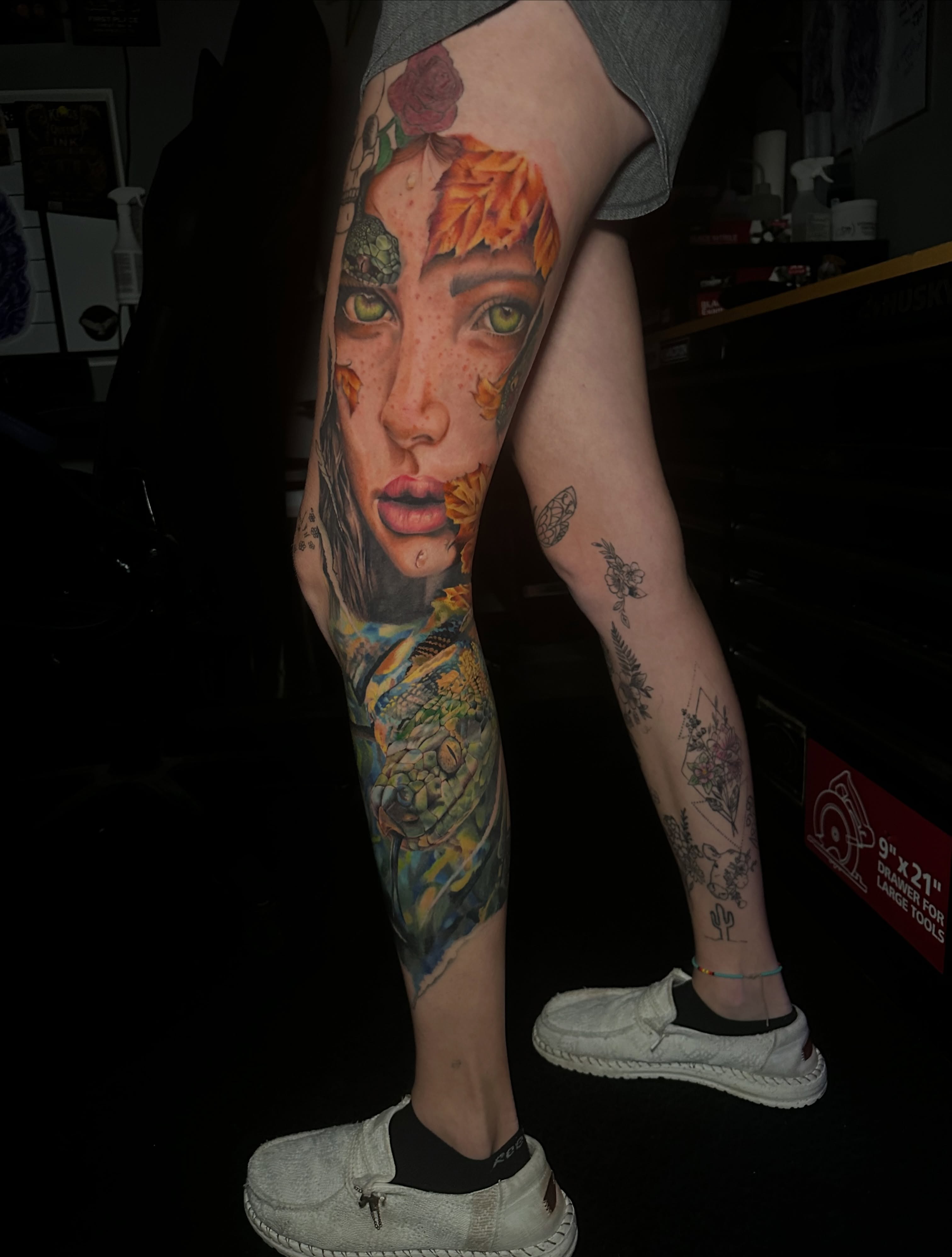 Female portrait realism tattoo on the leg by Elizabeth’s Eclectic Tattoos
