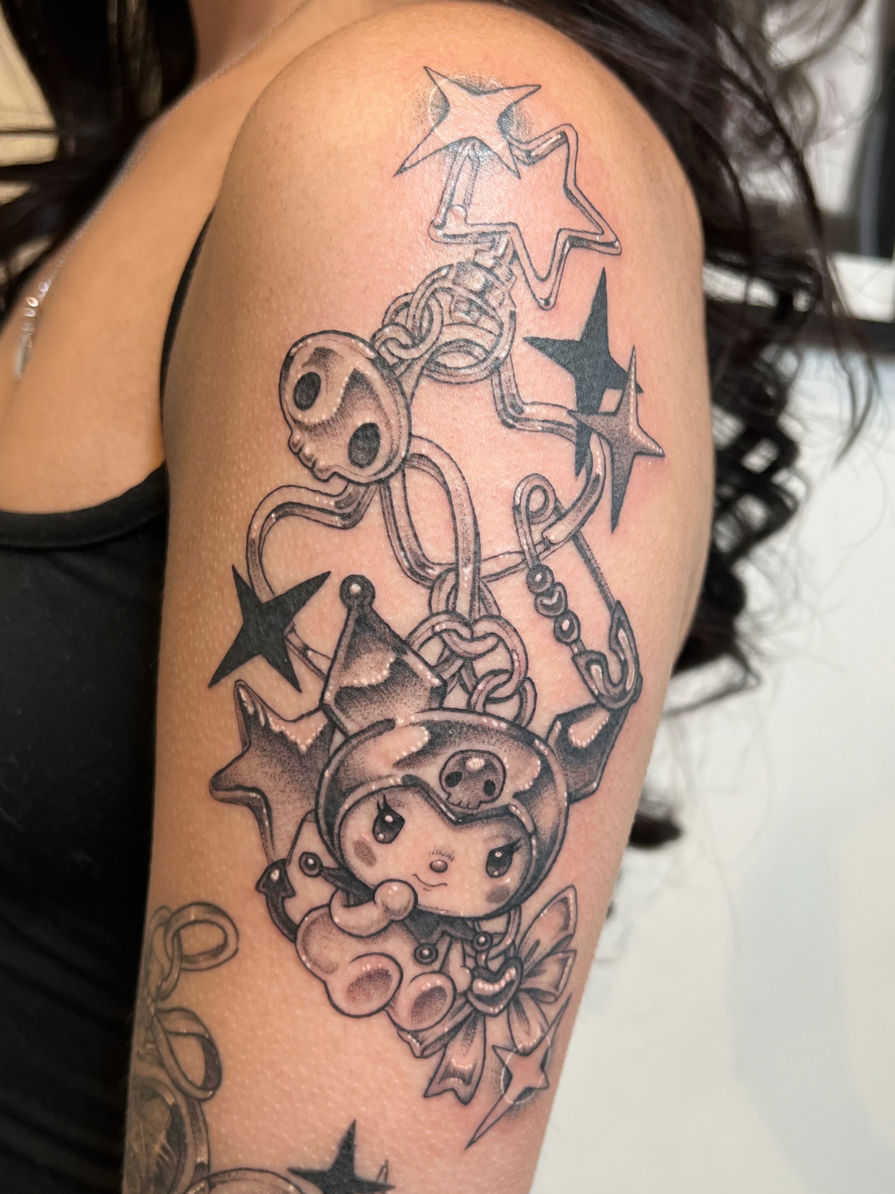 Chibi character with stars black and grey tattoo on the shoulder by ✮shayla ganong✮