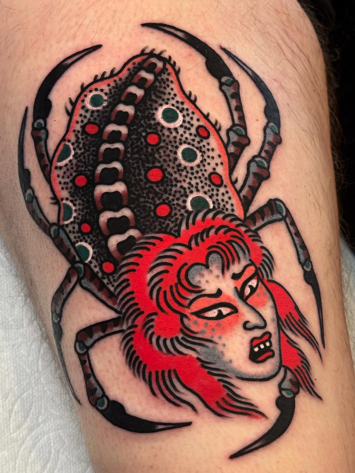 Spider woman American traditional tattoo on the thigh by Bryce Shearer