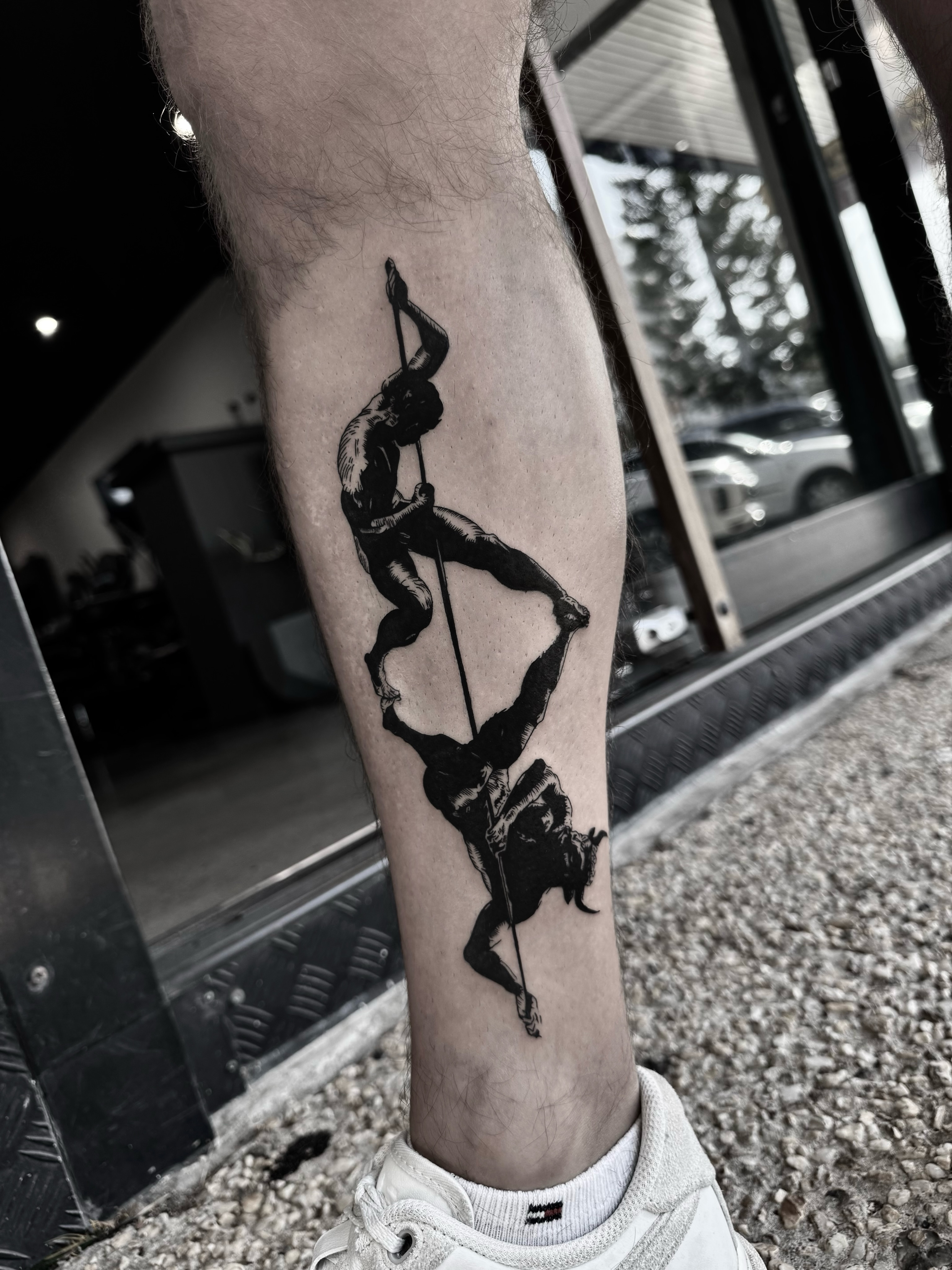 Pole dancing black and grey tattoo on the forearm by Blackwork Vamos