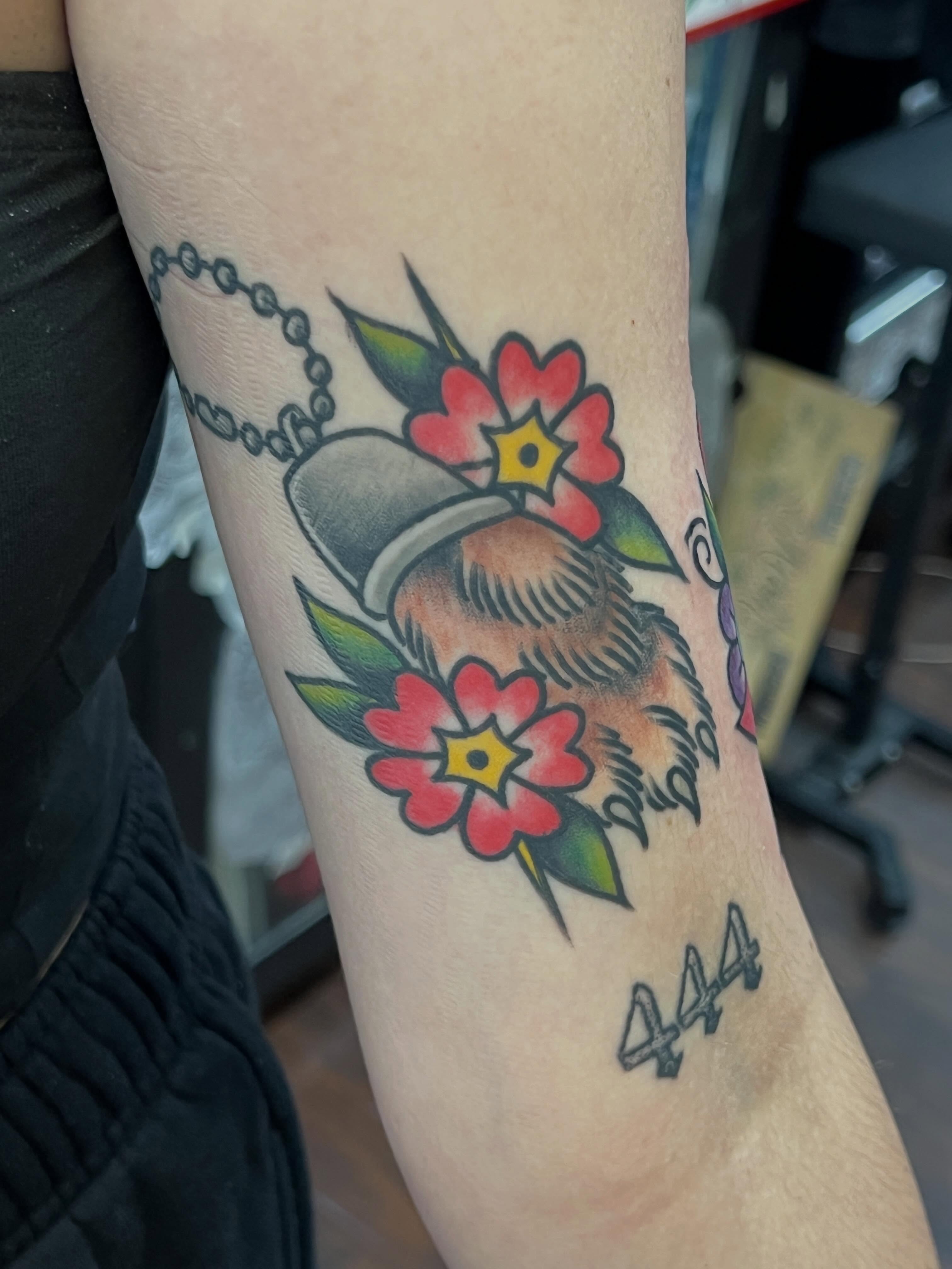 Beard and flowers American traditional tattoo on the forearm by Mat Helton, Fairborn, Ohio