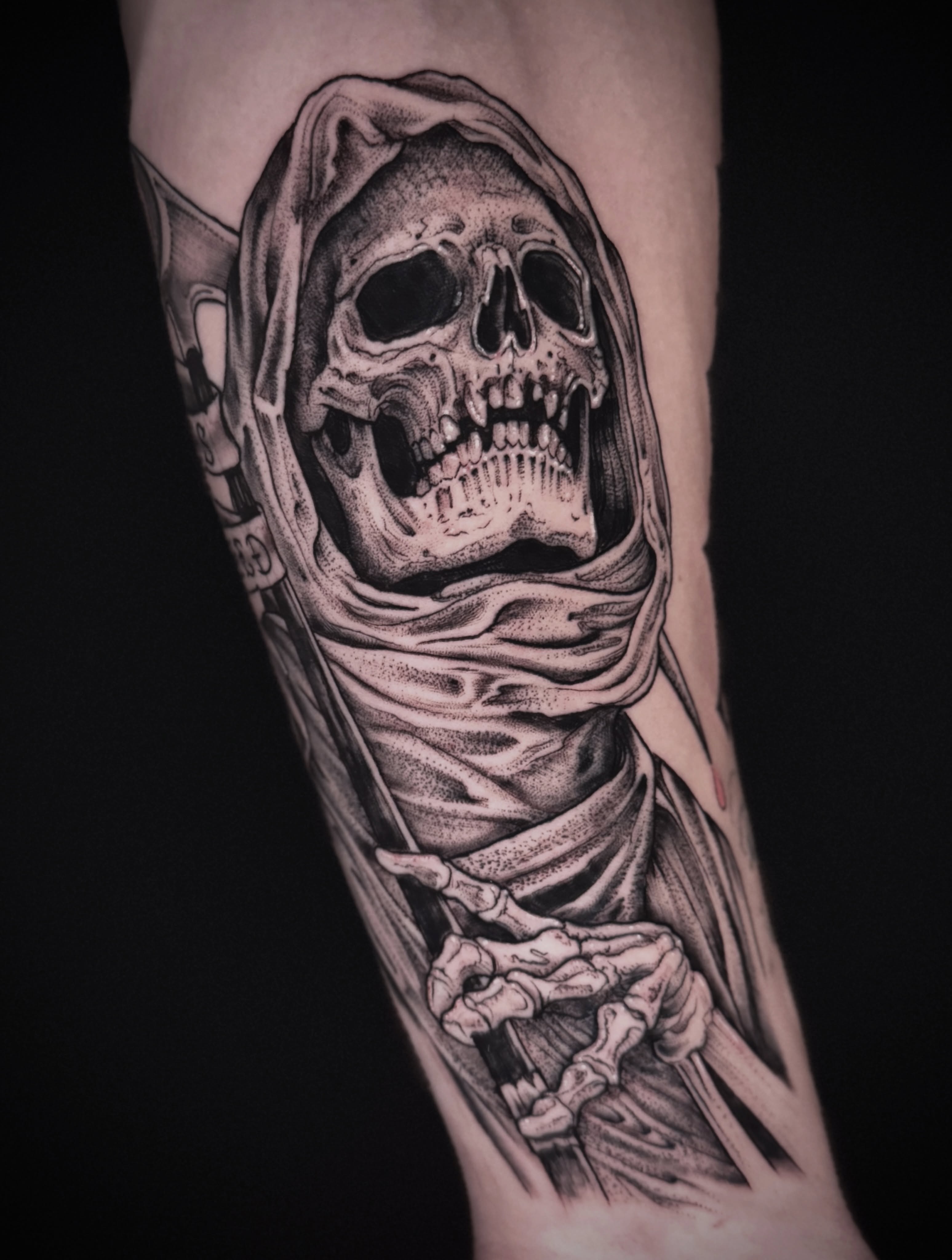 Grim reaper realism tattoo on the forearm by Giovanna Kline