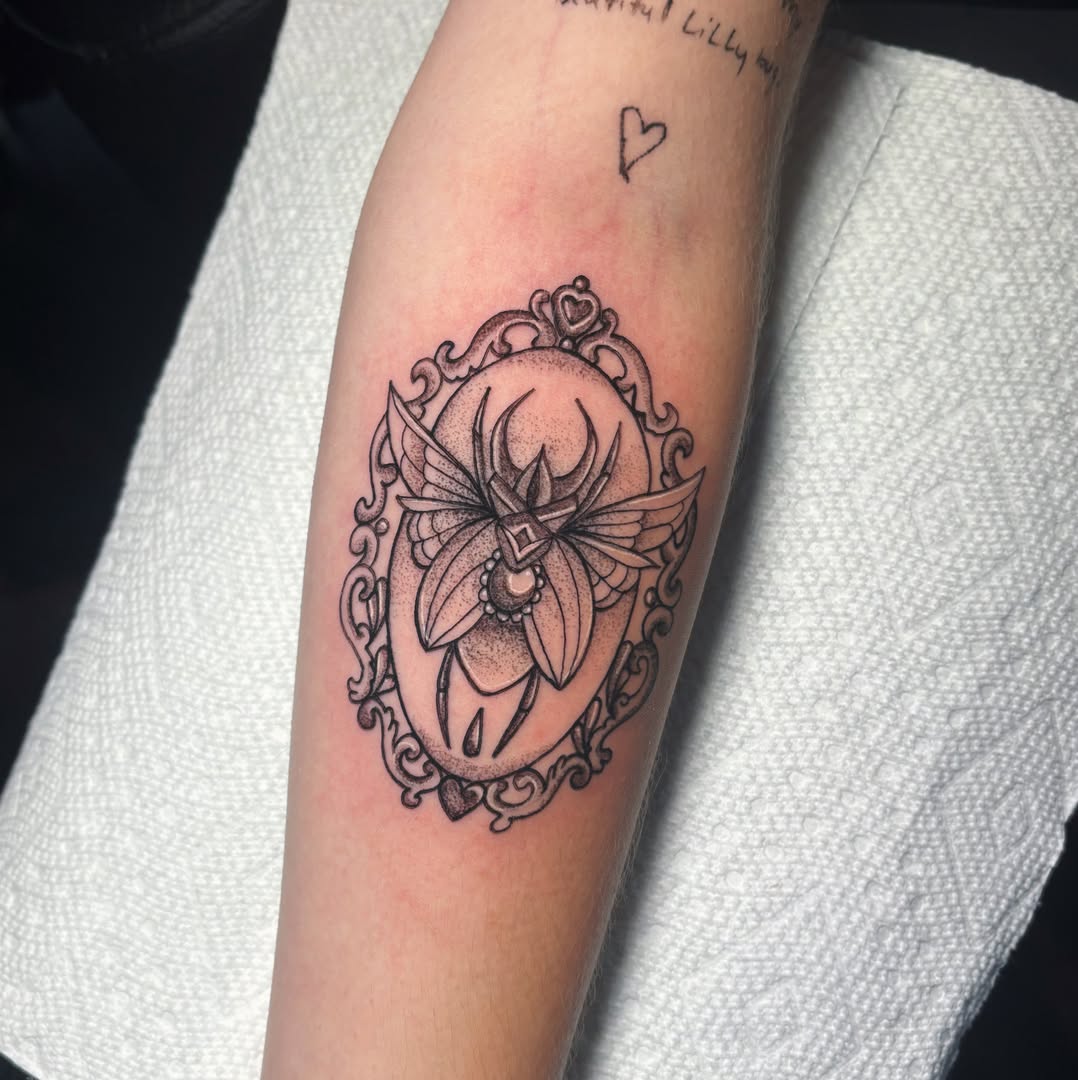 Flower with antlers dotwork tattoo on the forearm by Demi Flores 🖤