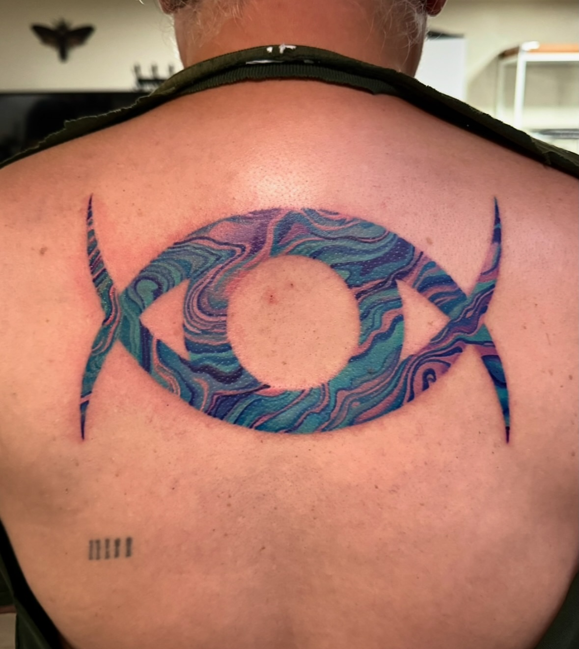 Tattoo by @bollingerart — geometric, watercolor