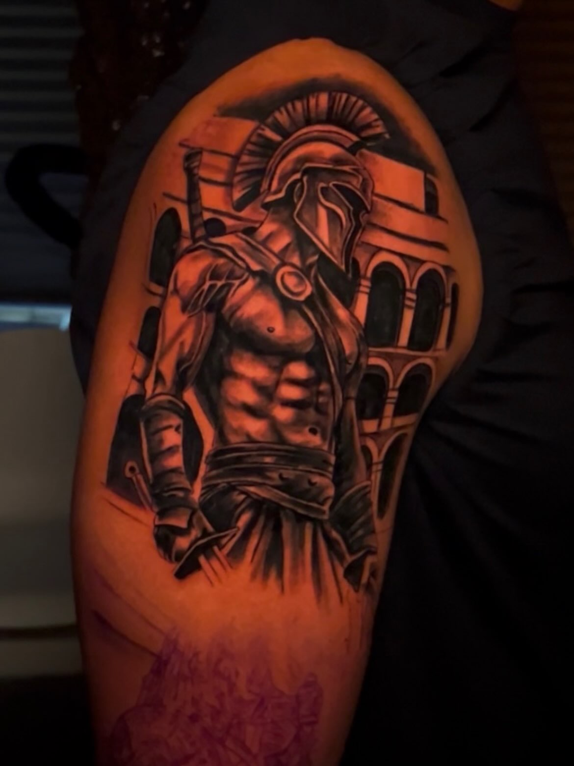 Gladiator realism tattoo on the upper arm by Lucky Lefty