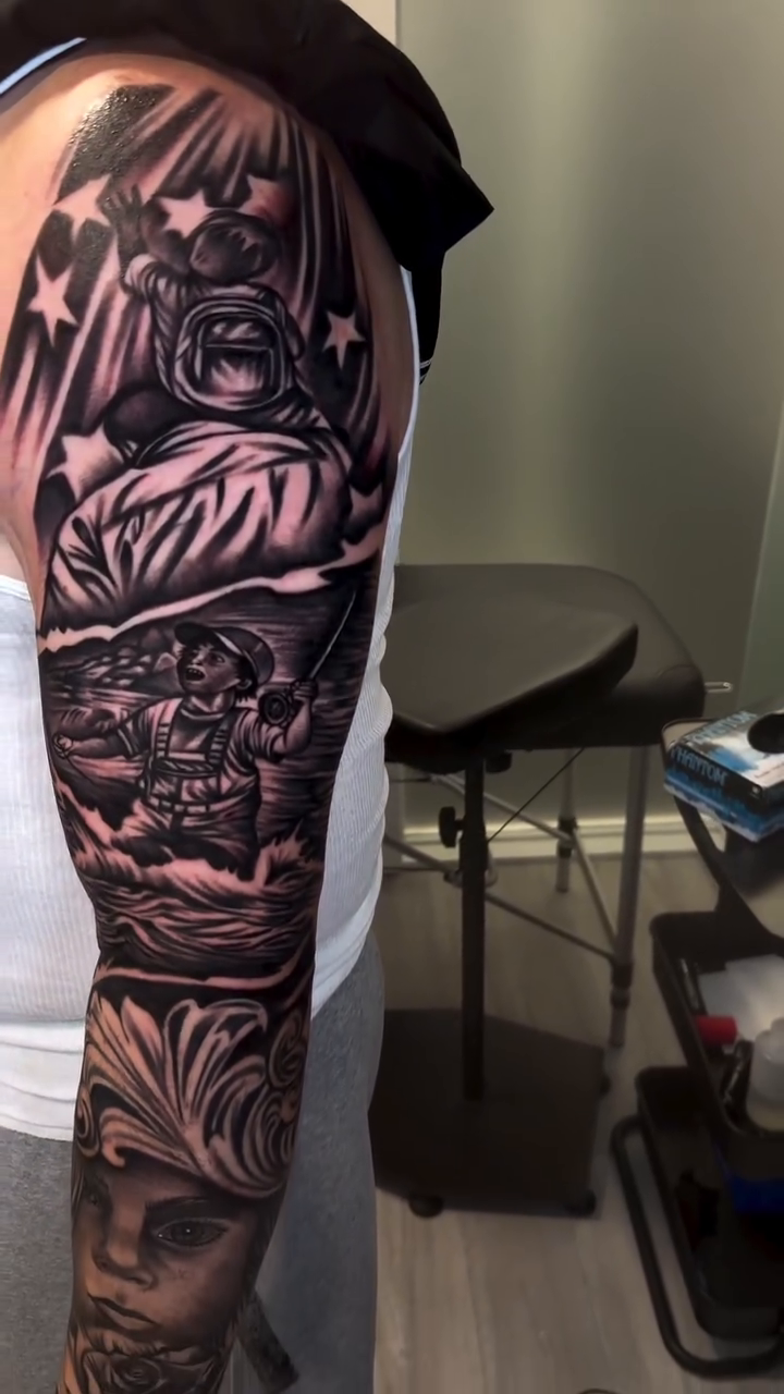 Buddha and a woman's face realism tattoo on the upper arm by Tattoo Artist New York and Jersey