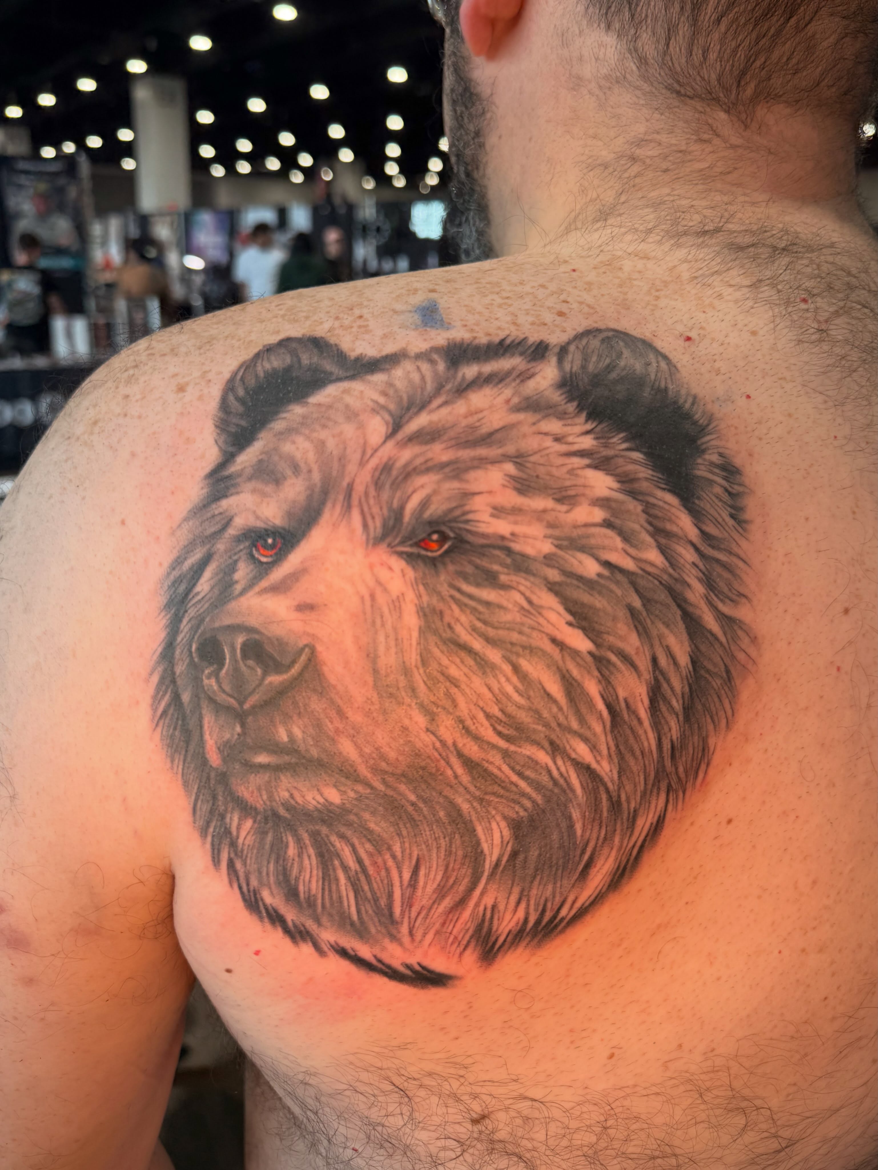 Bear realism tattoo on the back by InkdByHendrixx
