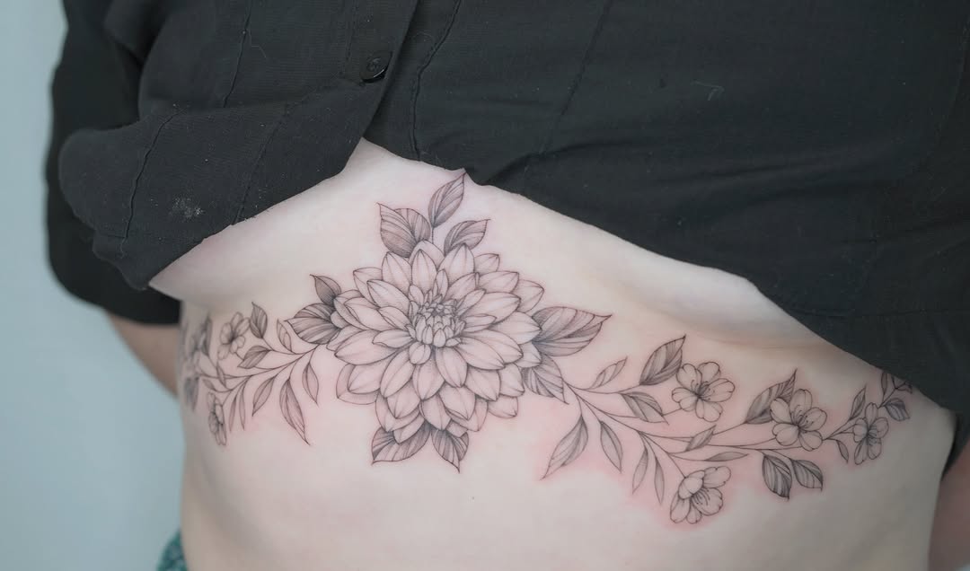 Flower bouquet black and grey tattoo on the ribs by Seattle tattoo artist-Mia
