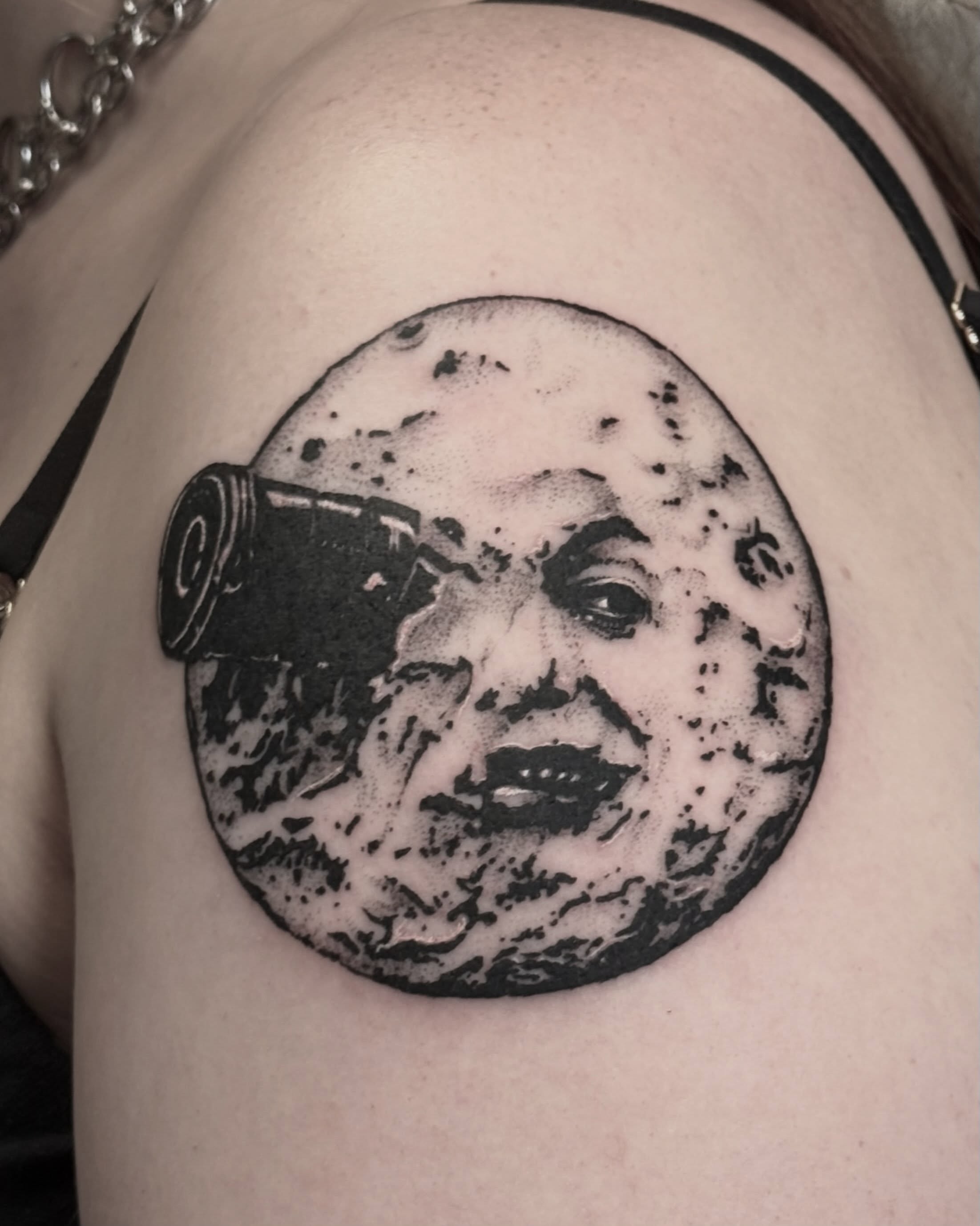 Moon with face dotwork tattoo on the shoulder by Christian