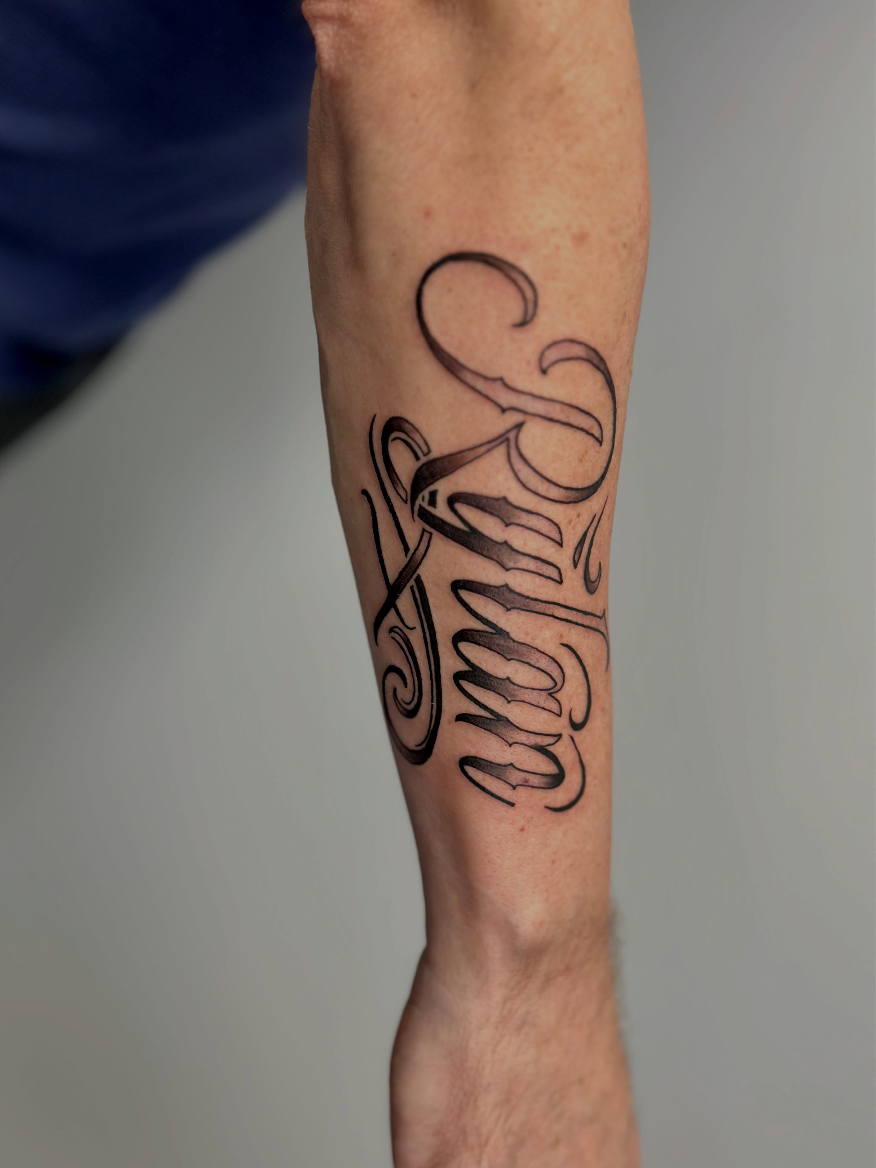 Script lettering lettering script tattoo on the forearm by AJ