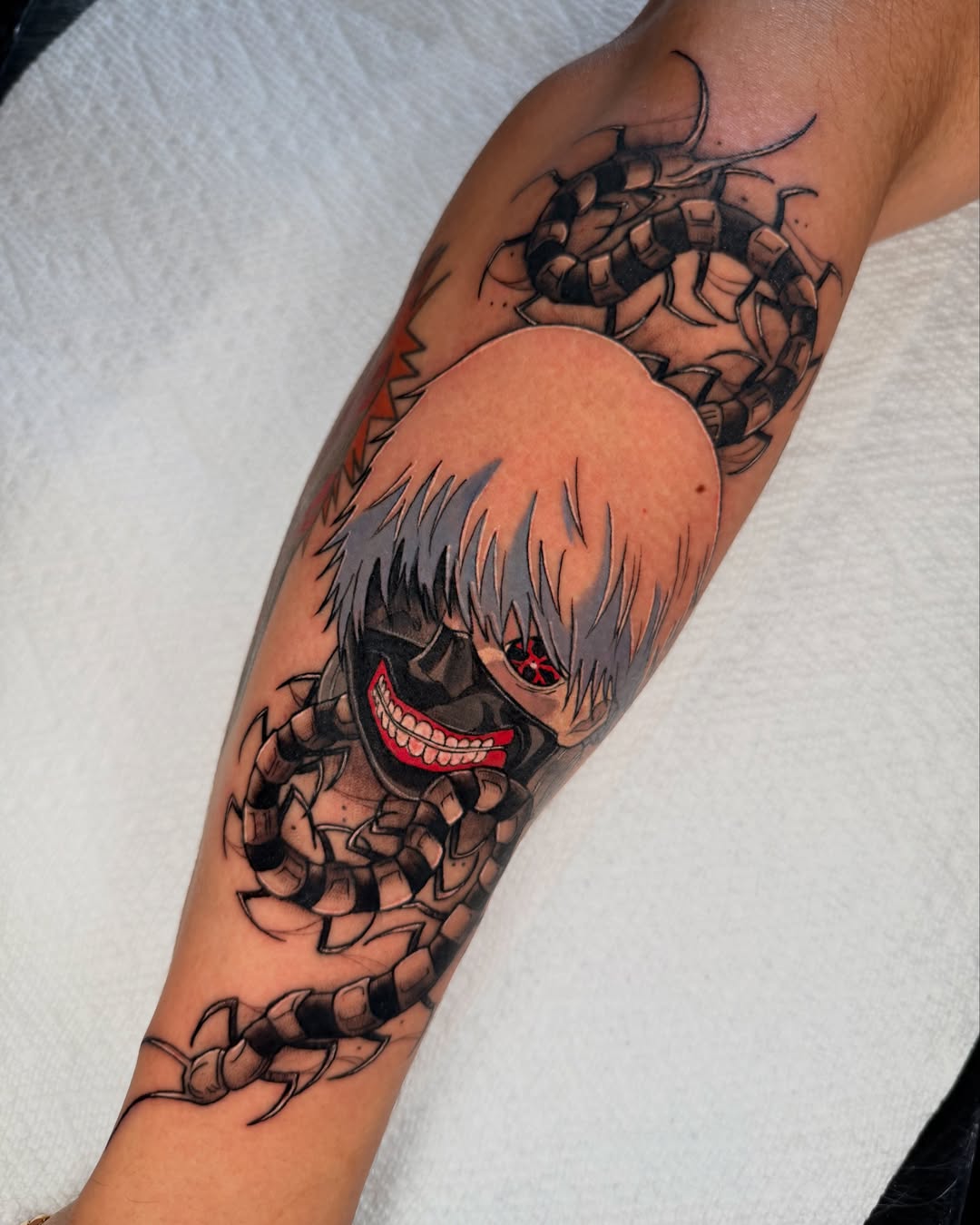 Tokyo ghoul character anime tattoo on the forearm by Rigo4k