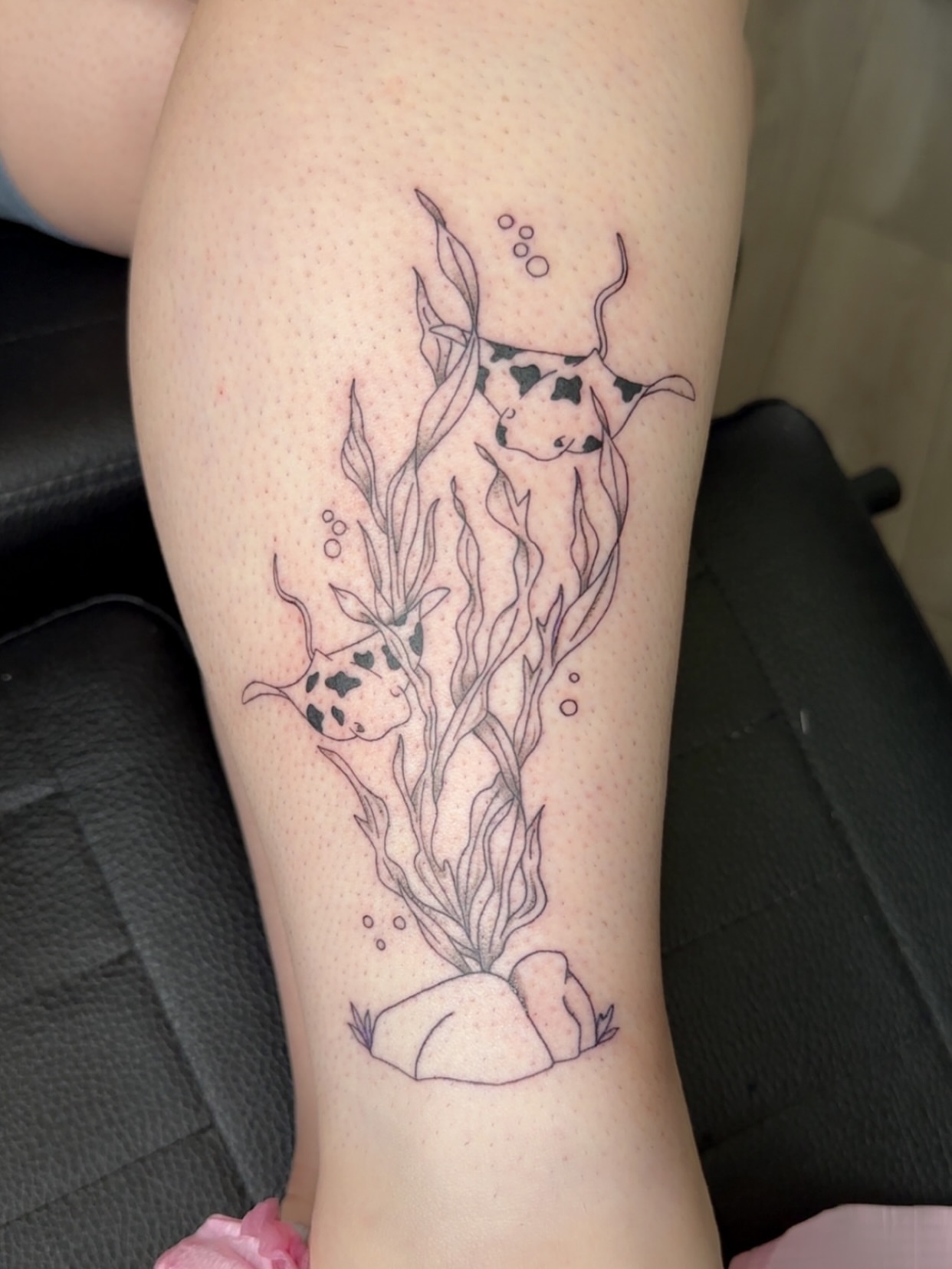 Seaweed and fish black and grey tattoo on the leg by NuNu