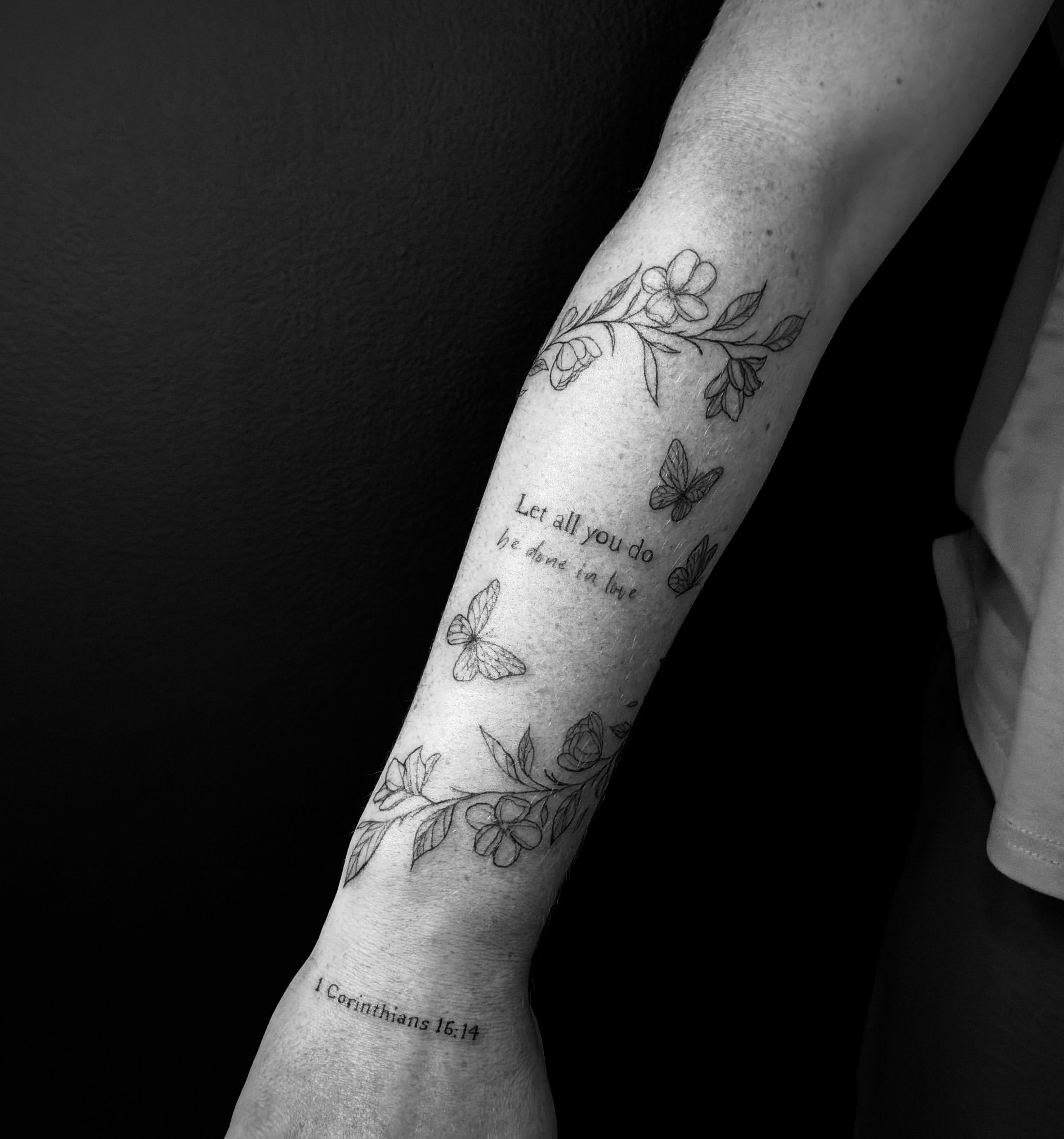 Flowers and butterflies black and grey tattoo on the forearm by TolzinInk, Brookings, South Dakota