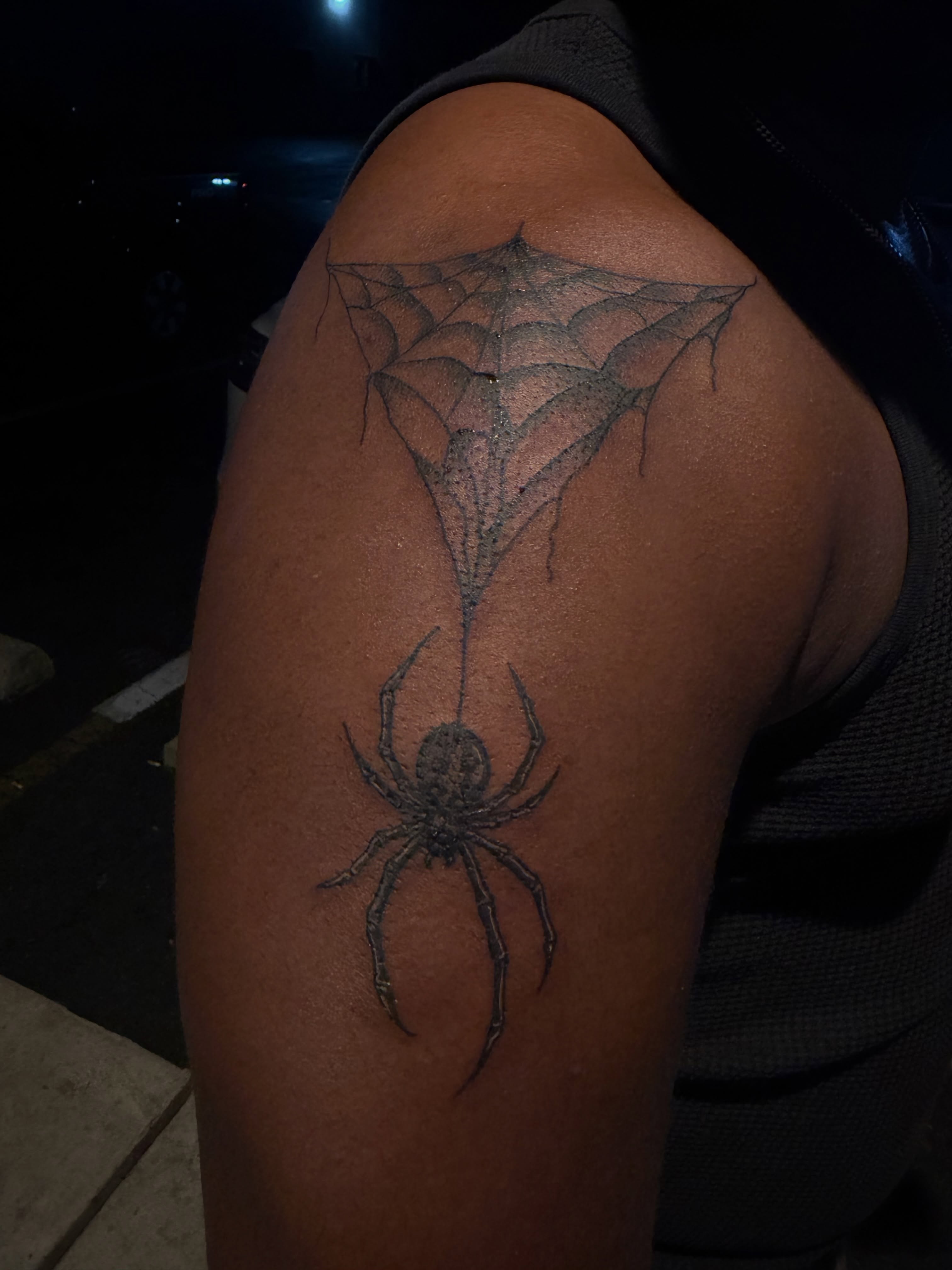 Spider and web dotwork tattoo on the shoulder by Humberto Vega