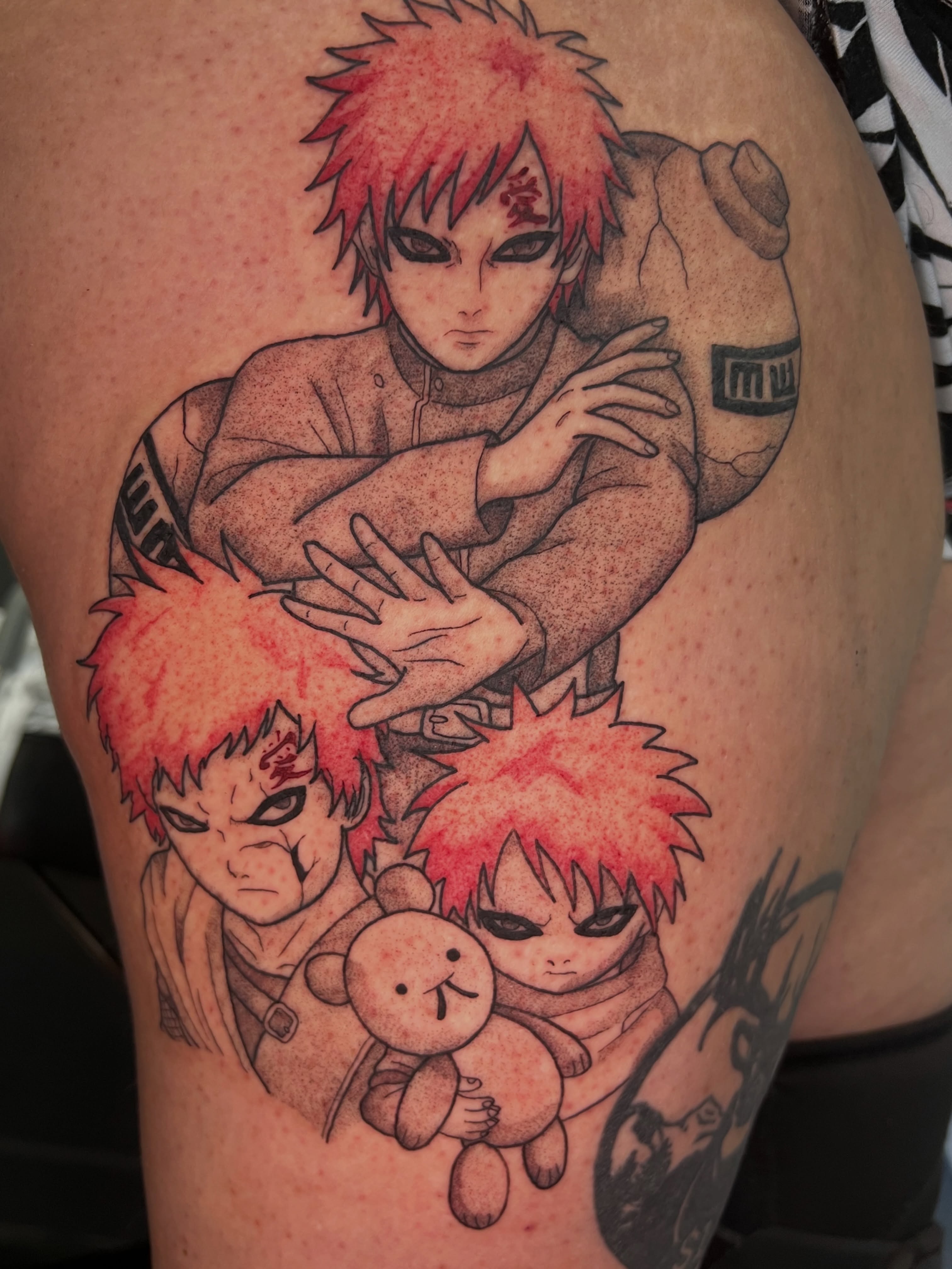 Anime characters anime tattoo on the thigh by Leslie Paskoff