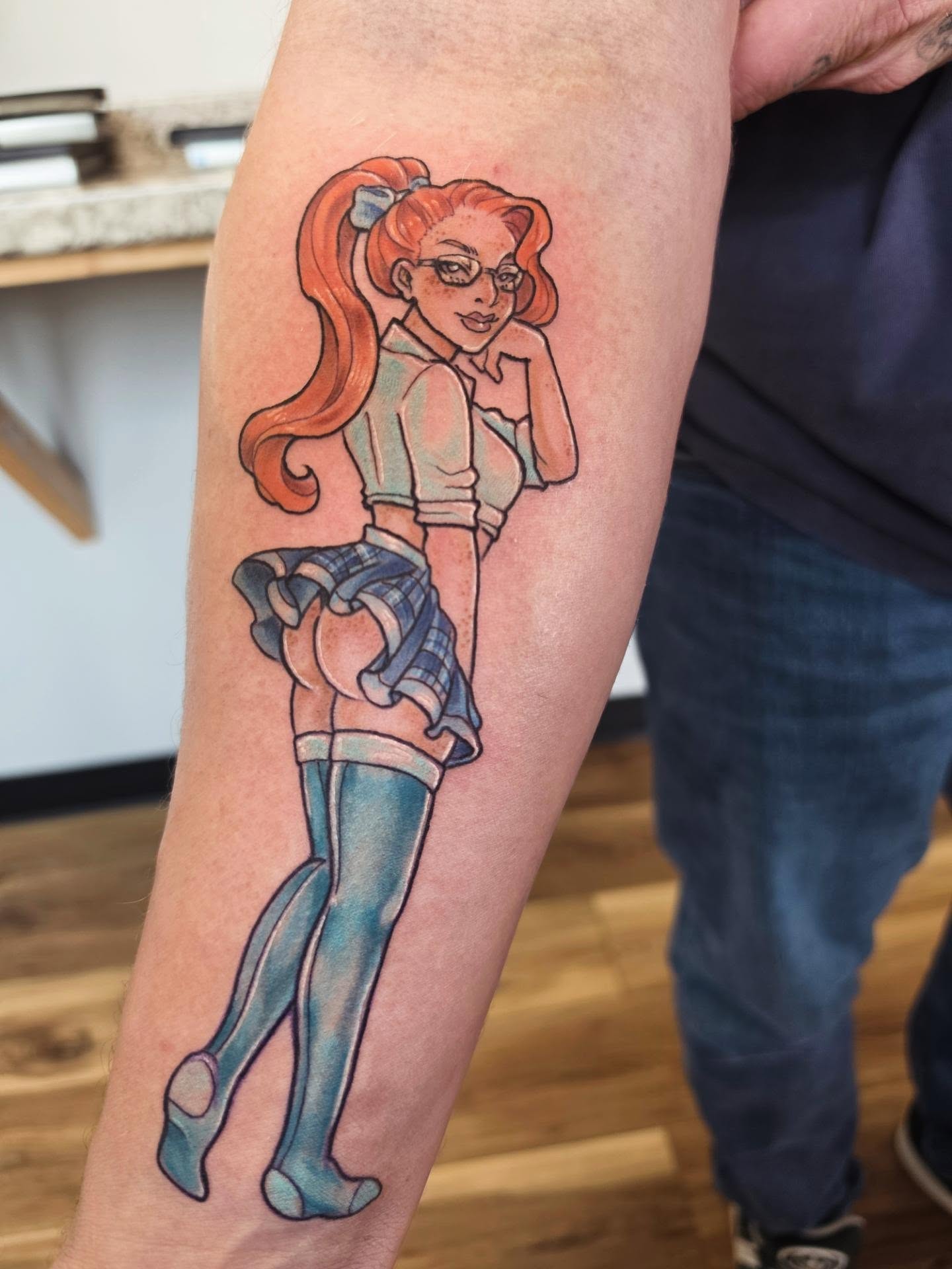 Anime girl anime tattoo on the forearm by Colleen