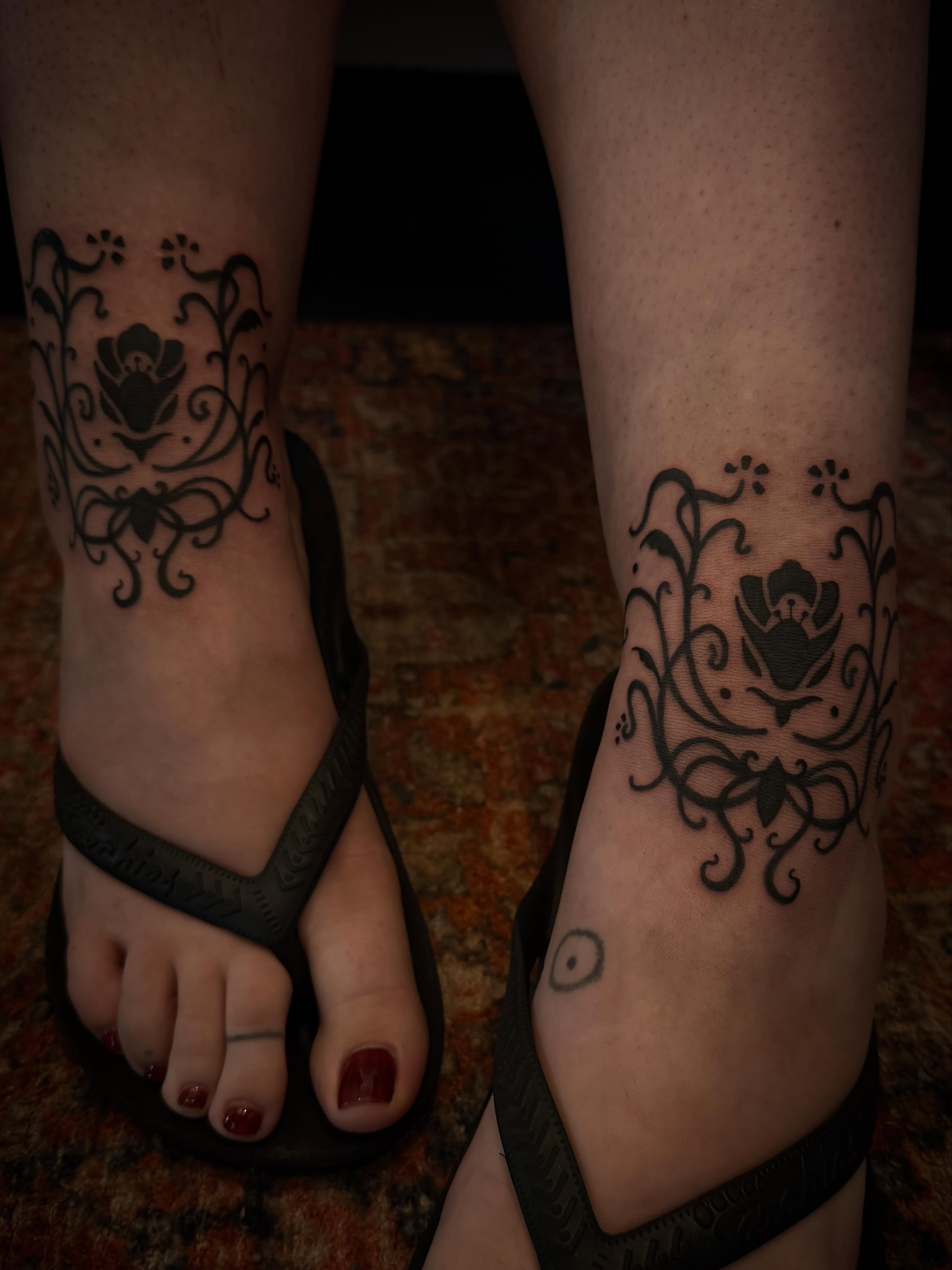 Floral ornament black and grey tattoo on the foot by Eden H., Columbus, Ohio