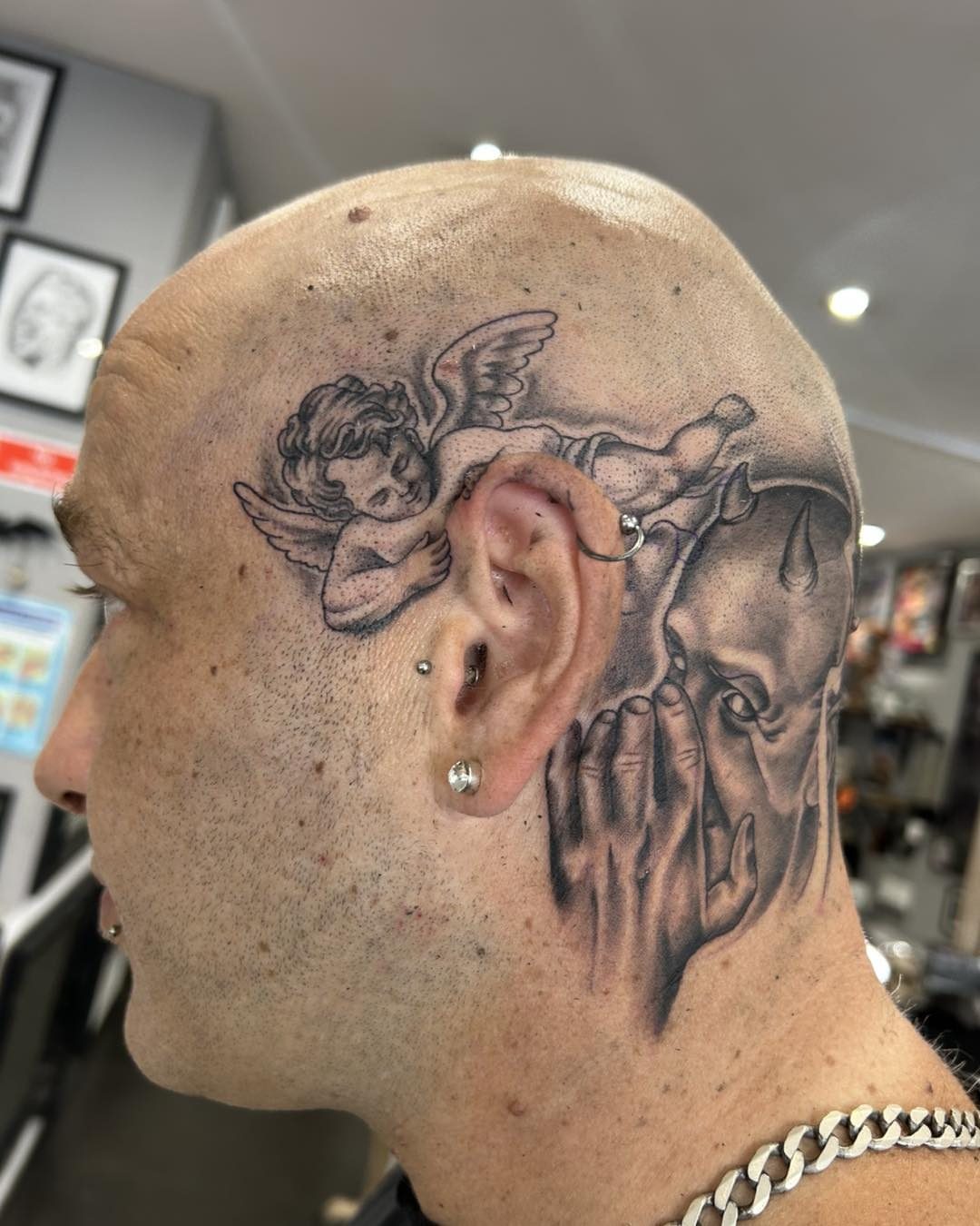 Angel black and grey tattoo on the head by Room 5 Tattoo