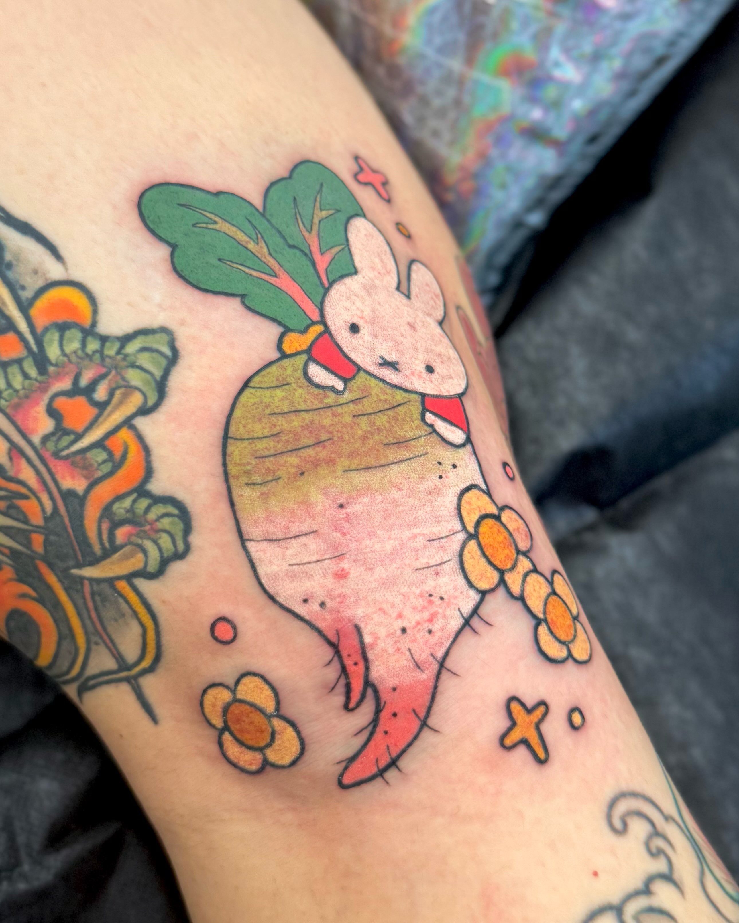 Rabbit in radish illustrative tattoo on the thigh by binh