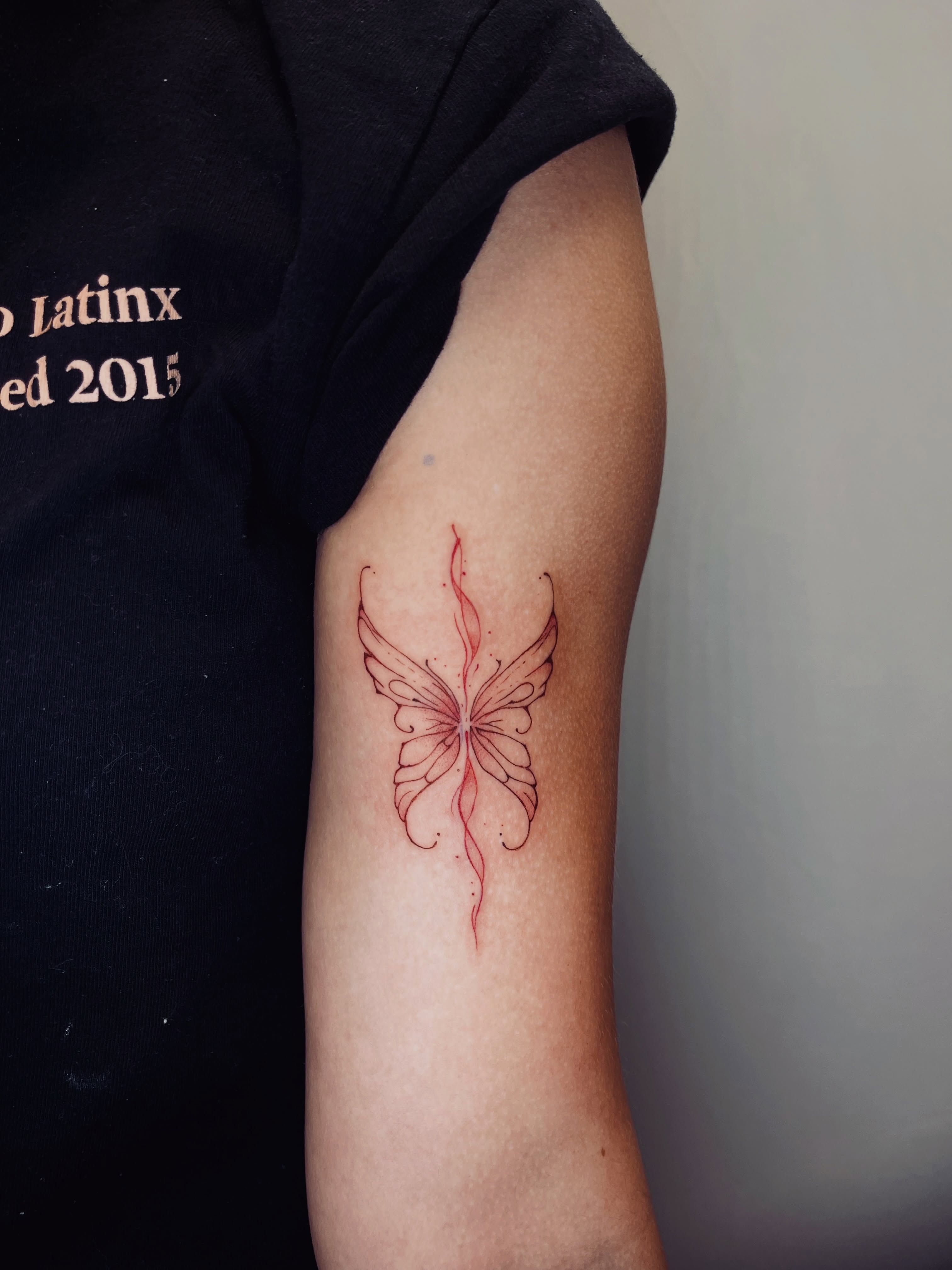 Butterfly fine line tattoo on the forearm by vivian
