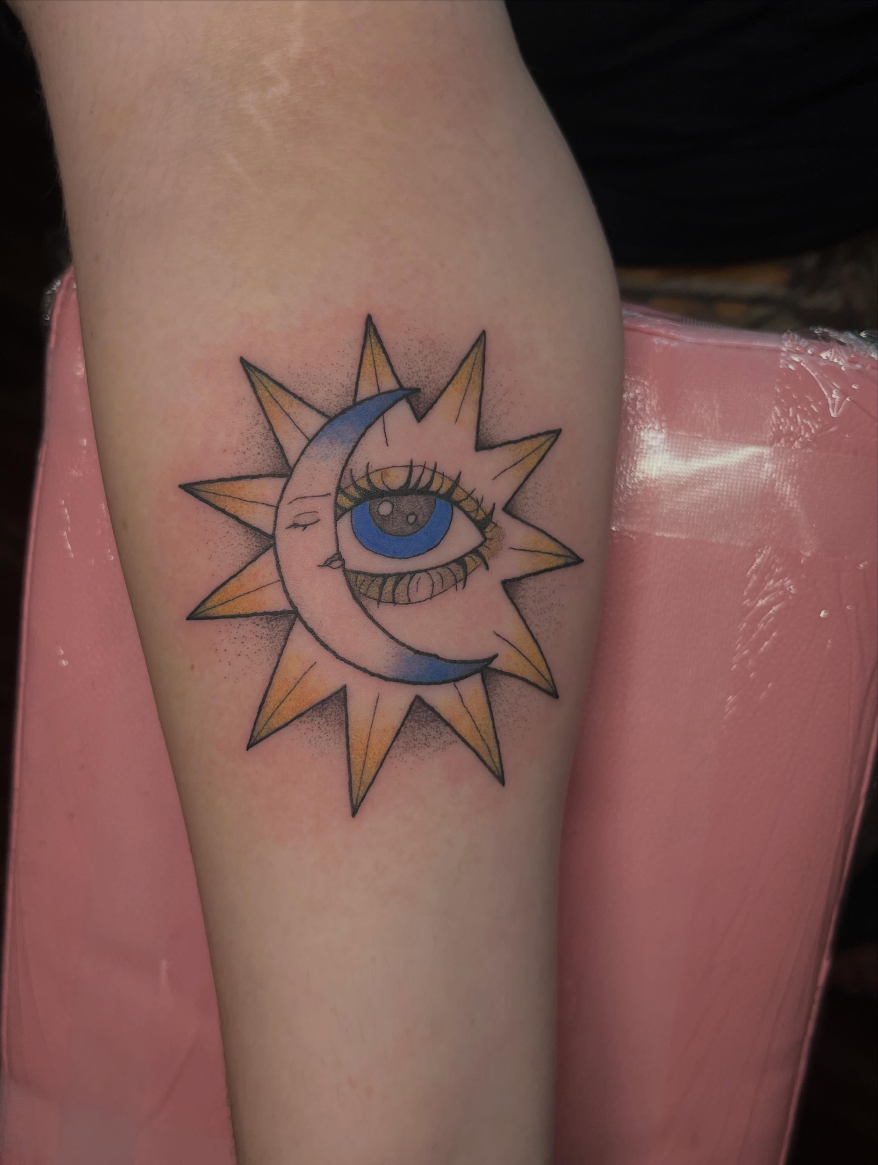 Sun and moon dotwork tattoo on the forearm by Jazzy