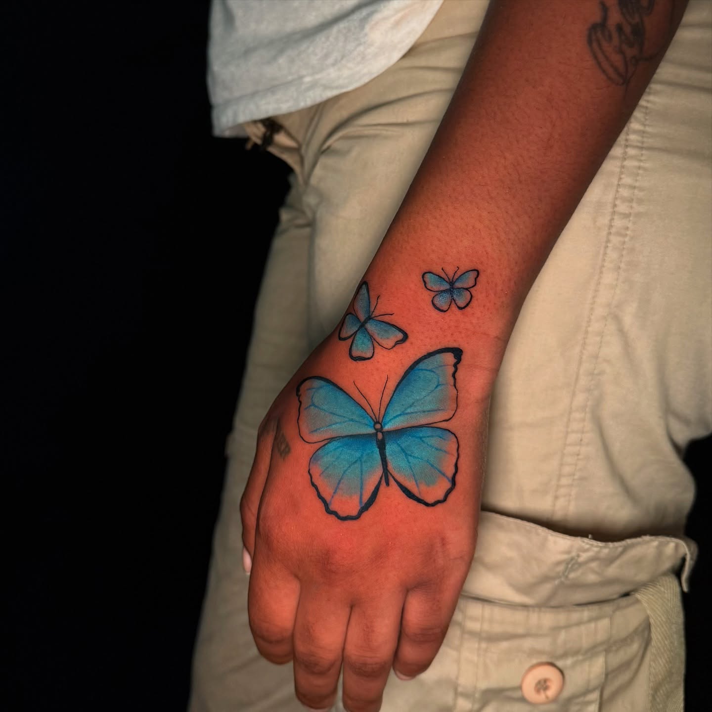 Butterfly realism tattoo on the hand by marlena borscheid
