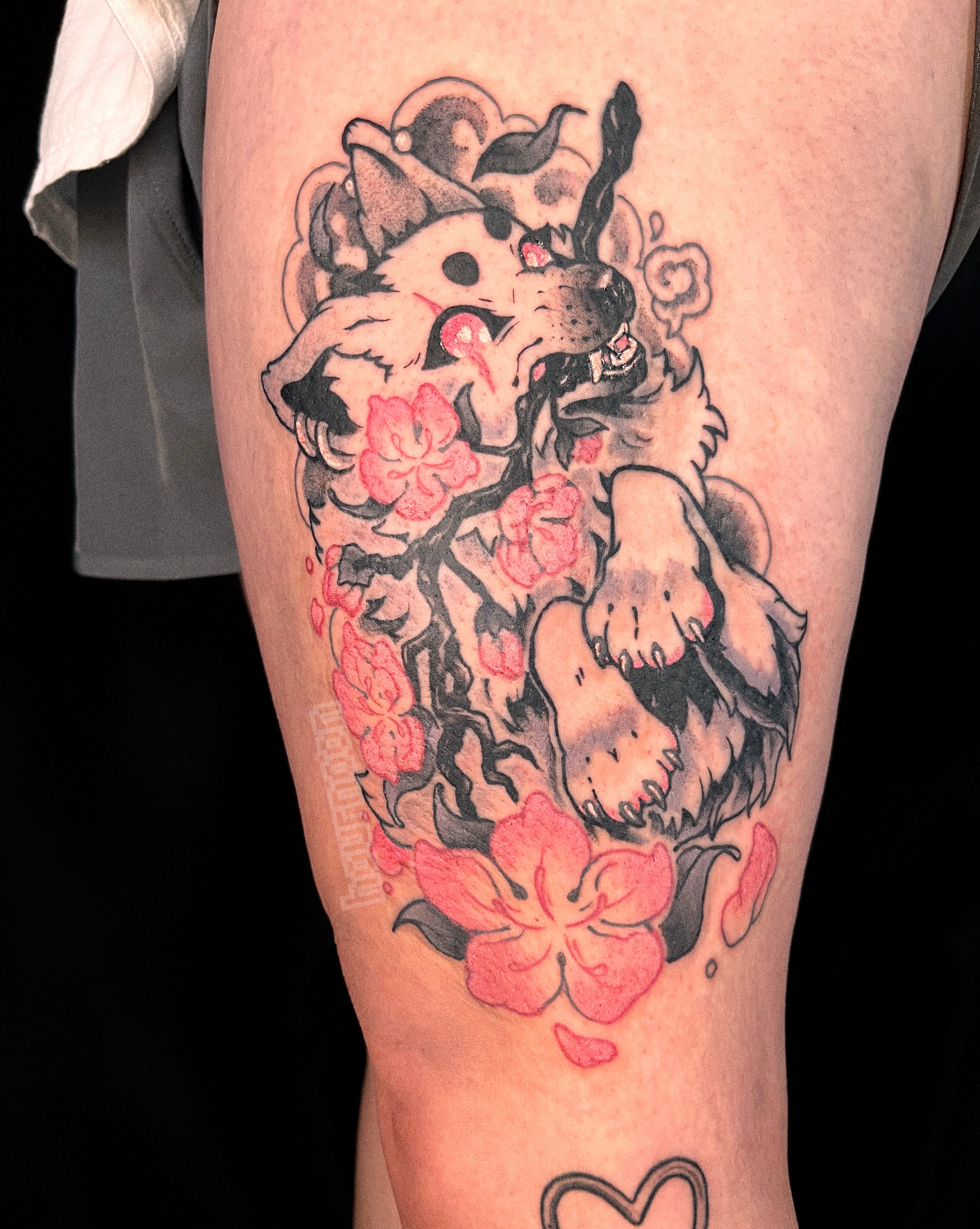 Wolf and cherry blossoms American traditional tattoo on the forearm by 𝖍𝖔𝖚𝖗𝖓𝖔𝖔𝖓