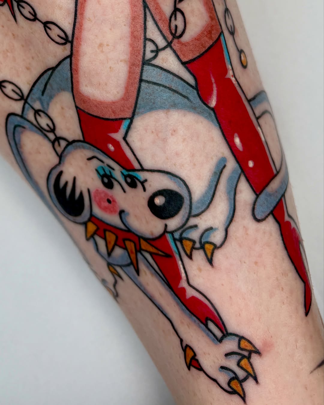 Dog American traditional tattoo on the forearm by Bella