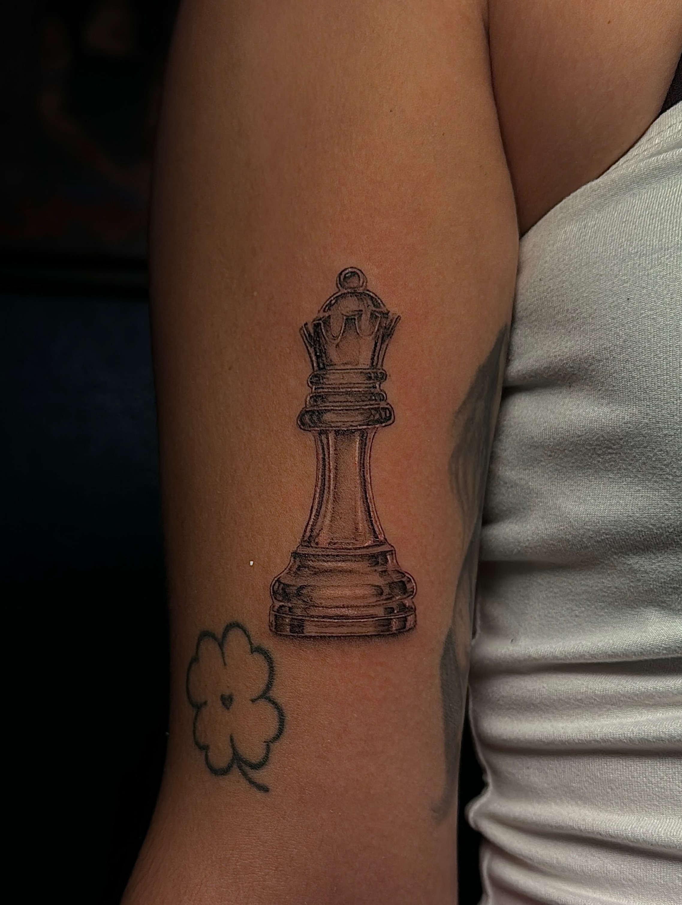 Chess queen black and grey tattoo on the forearm by star🪭
