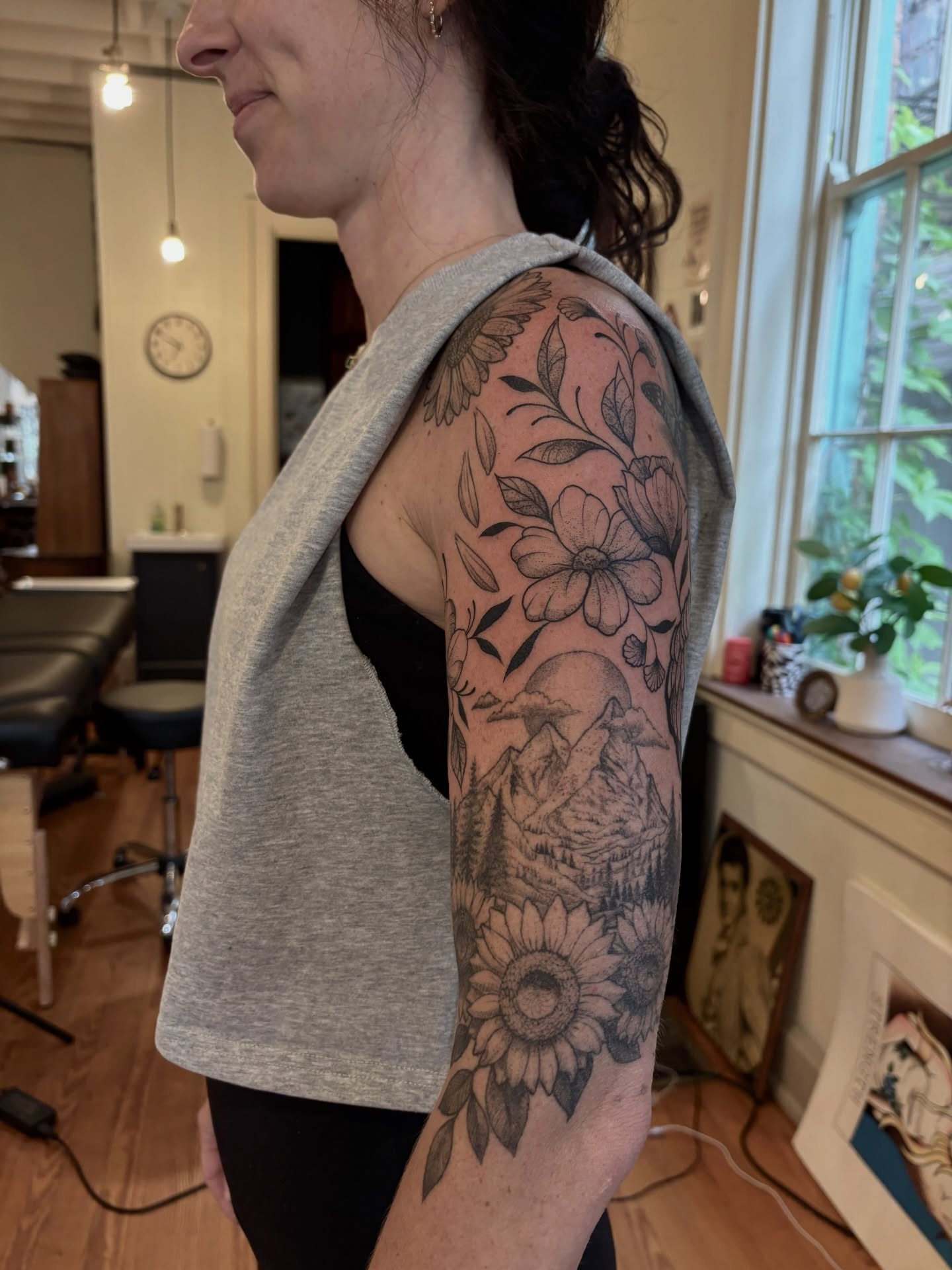 Sunflower and floral landscape realism tattoo on the forearm by V ☆ Cincinnati Tattoo Artist