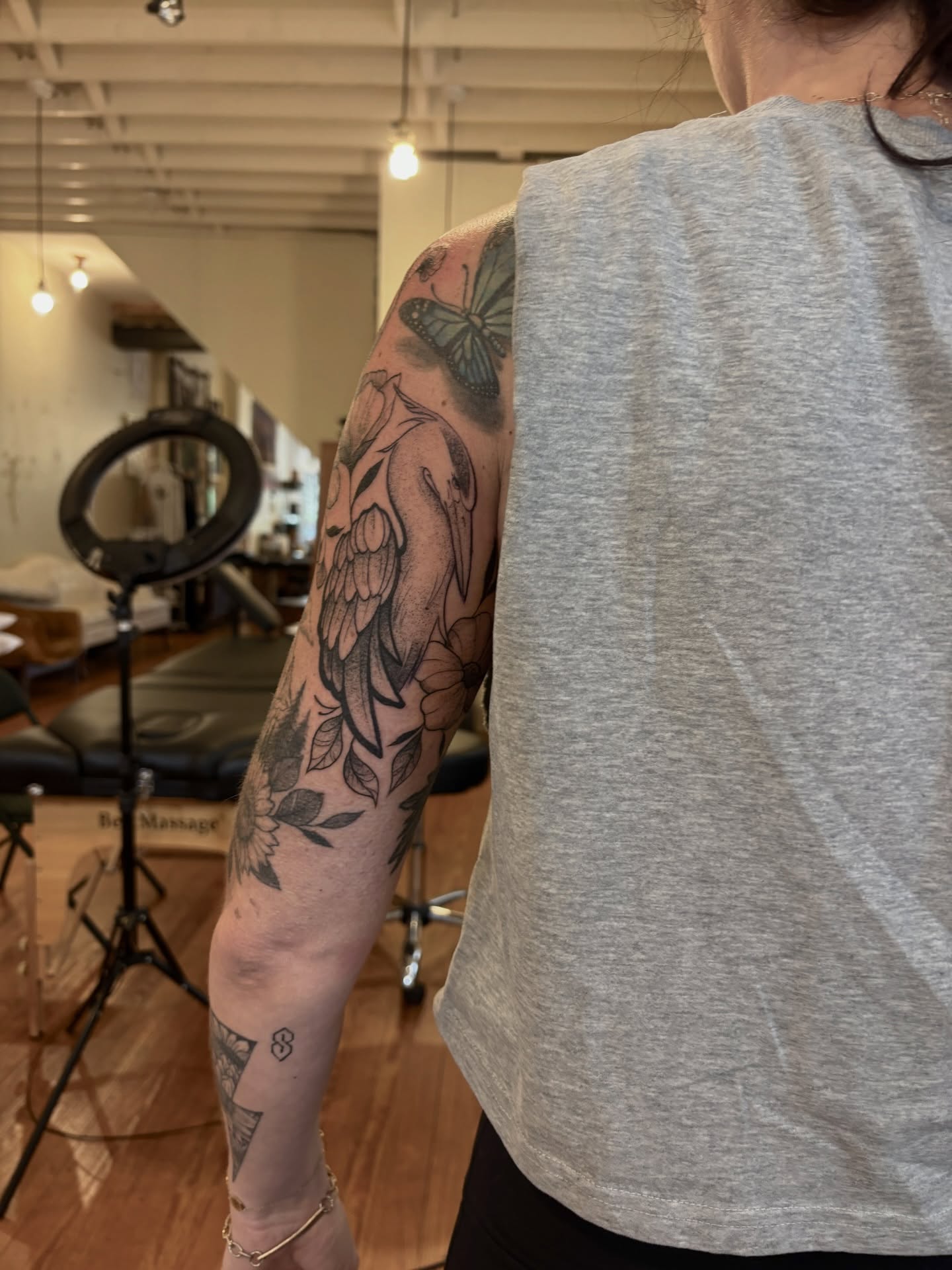 Bird and butterfly American traditional tattoo on the upper arm by V ☆ Cincinnati Tattoo Artist