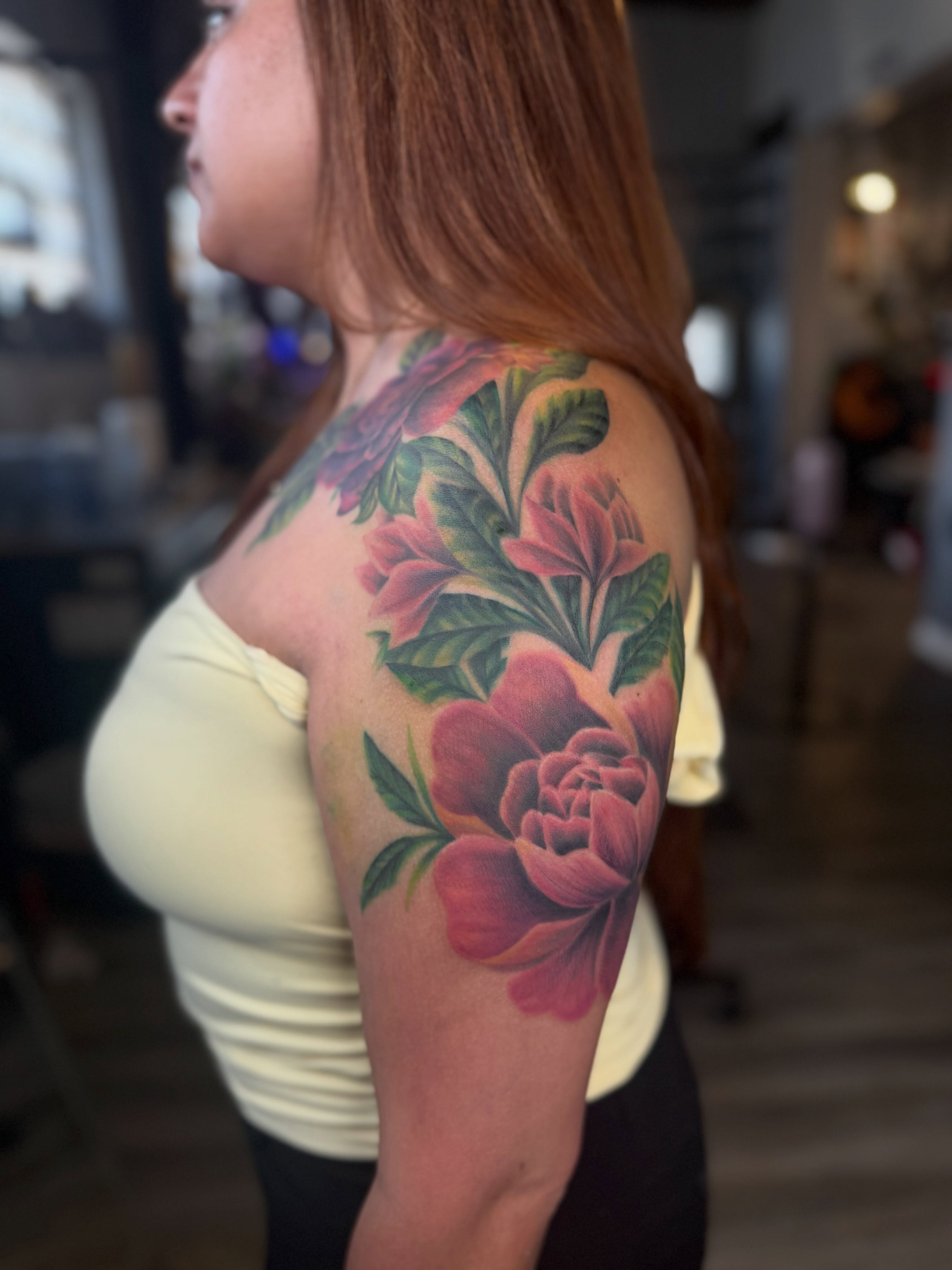 Peony realism tattoo on the shoulder by Stephanie Cruz, Kansas City, Missouri