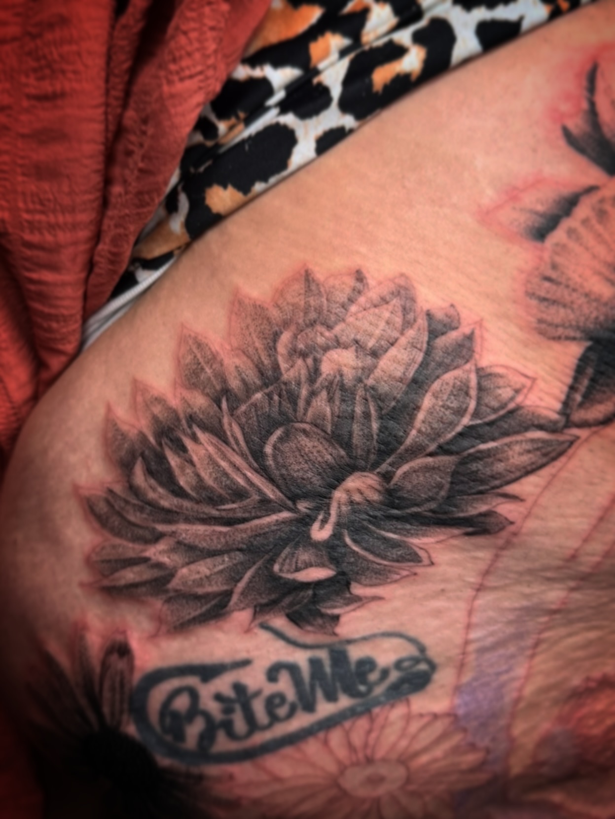 Succulent black and grey tattoo on the thigh by Aaron Strobehn
